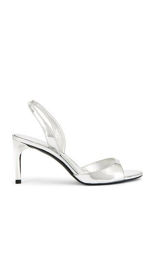 Schutz Scarlett Sling Mid Sandal in Metallic Silver. - size 9.5 | Revolve Clothing (Global)