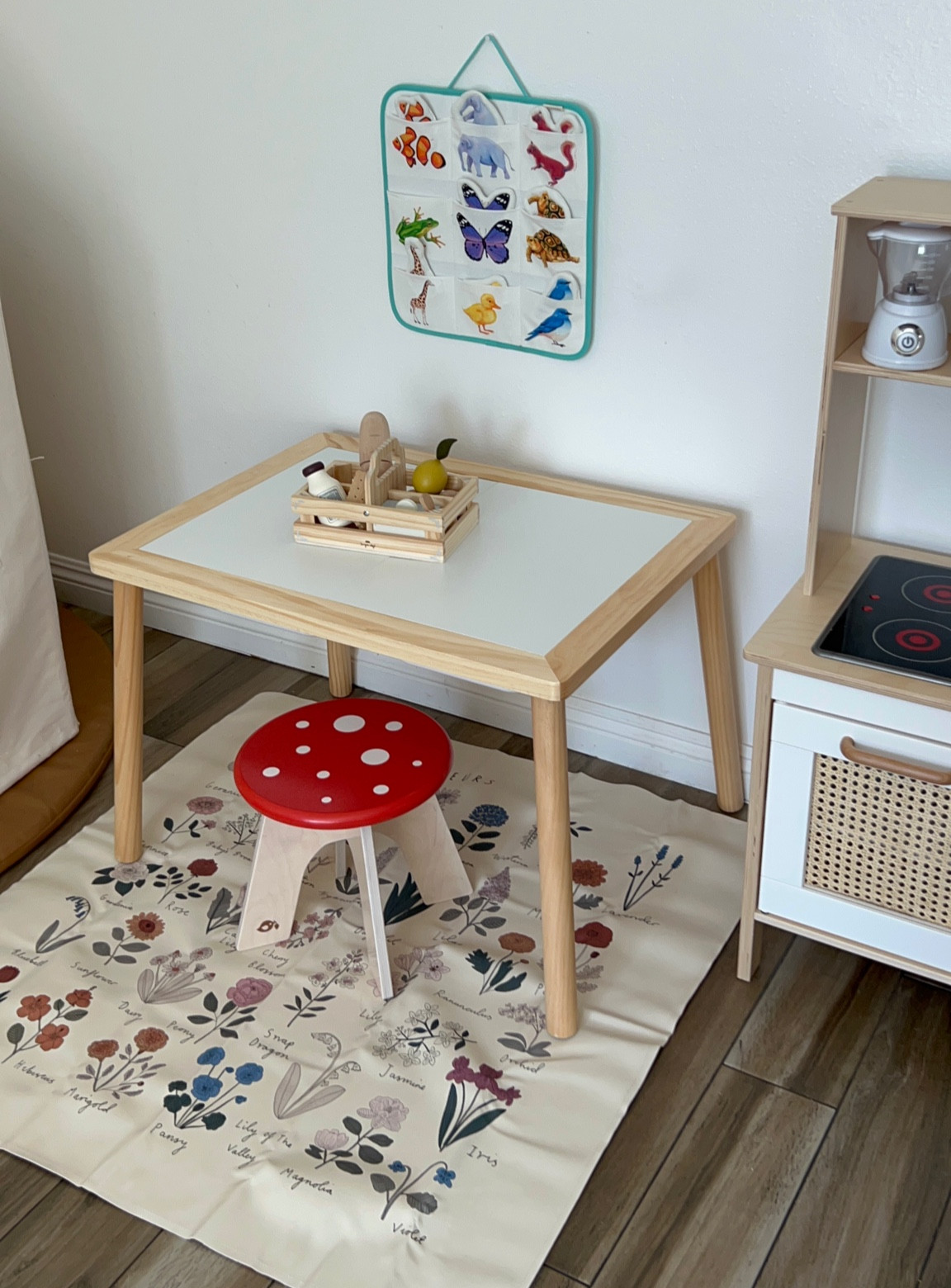 Latest sensory / Montessori play & independent eating table set up // added the floor mat underneath to help with messes and easier cleanups! 
Obsessed🥹🌱🌷🌿🌻

#LTKbaby #LTKfamily #LTKkids