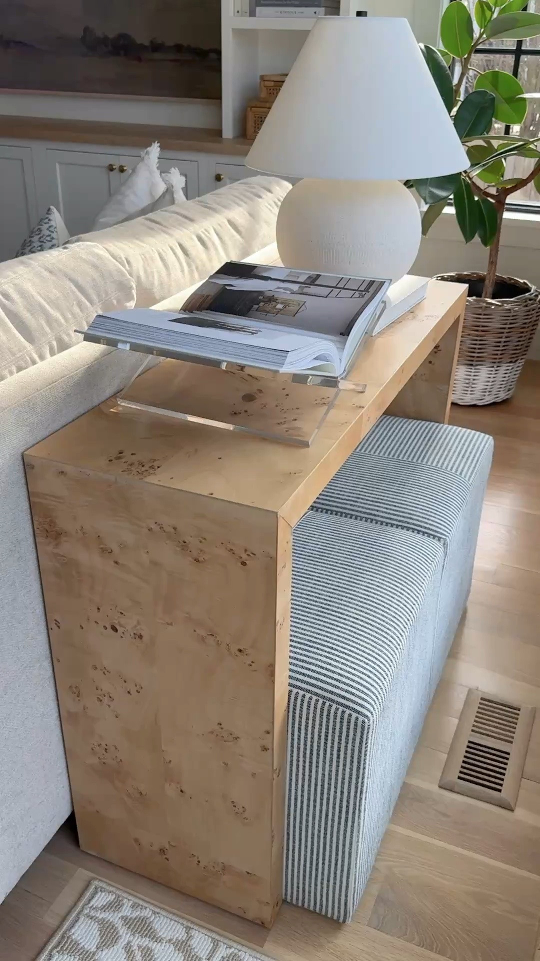 A simple designer trick that makes a floating sofa feel intentional? Add a console table behind it. It instantly anchors the seating area, creates a finished look, and gives you another surface for lighting, books, or styling.

I'm especially drawn to burled wood because it's one of those rare finishes that works with almost anything. It blends beautifully with light oak, walnut, painted furniture, and mixed metals, so it takes the guesswork out of mixing wood tones while adding warmth and subtle texture.

Linking a few of my favorite burled wood console tables (of all price points) that are perfect behind a sofa or in an entryway.

#LTKSaleAlert #LTKHome #LTKdayinmylife