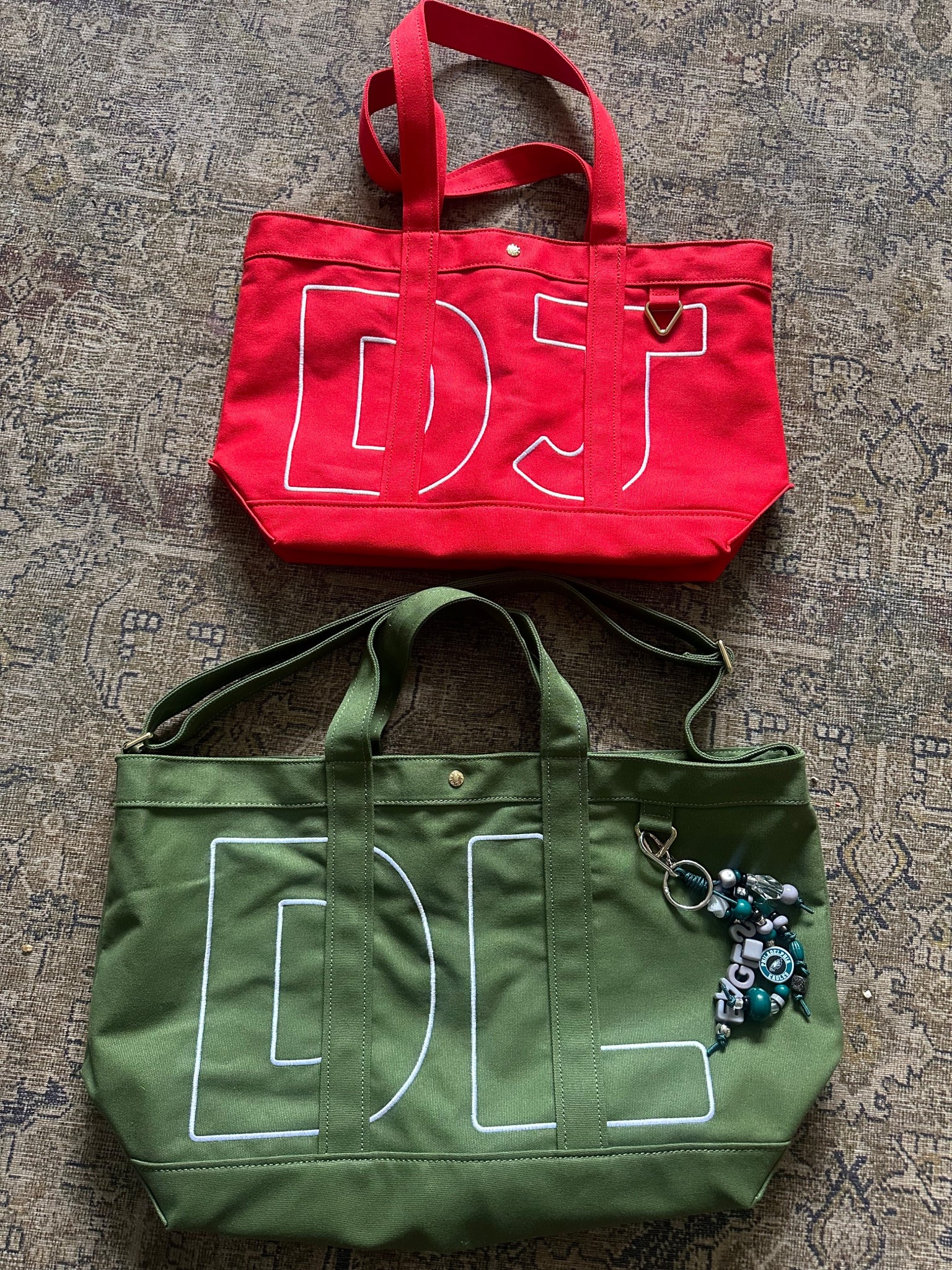 Obsessed with my custom Alpha Totes from BaubleBar.  I have the large size in olive and medium in red