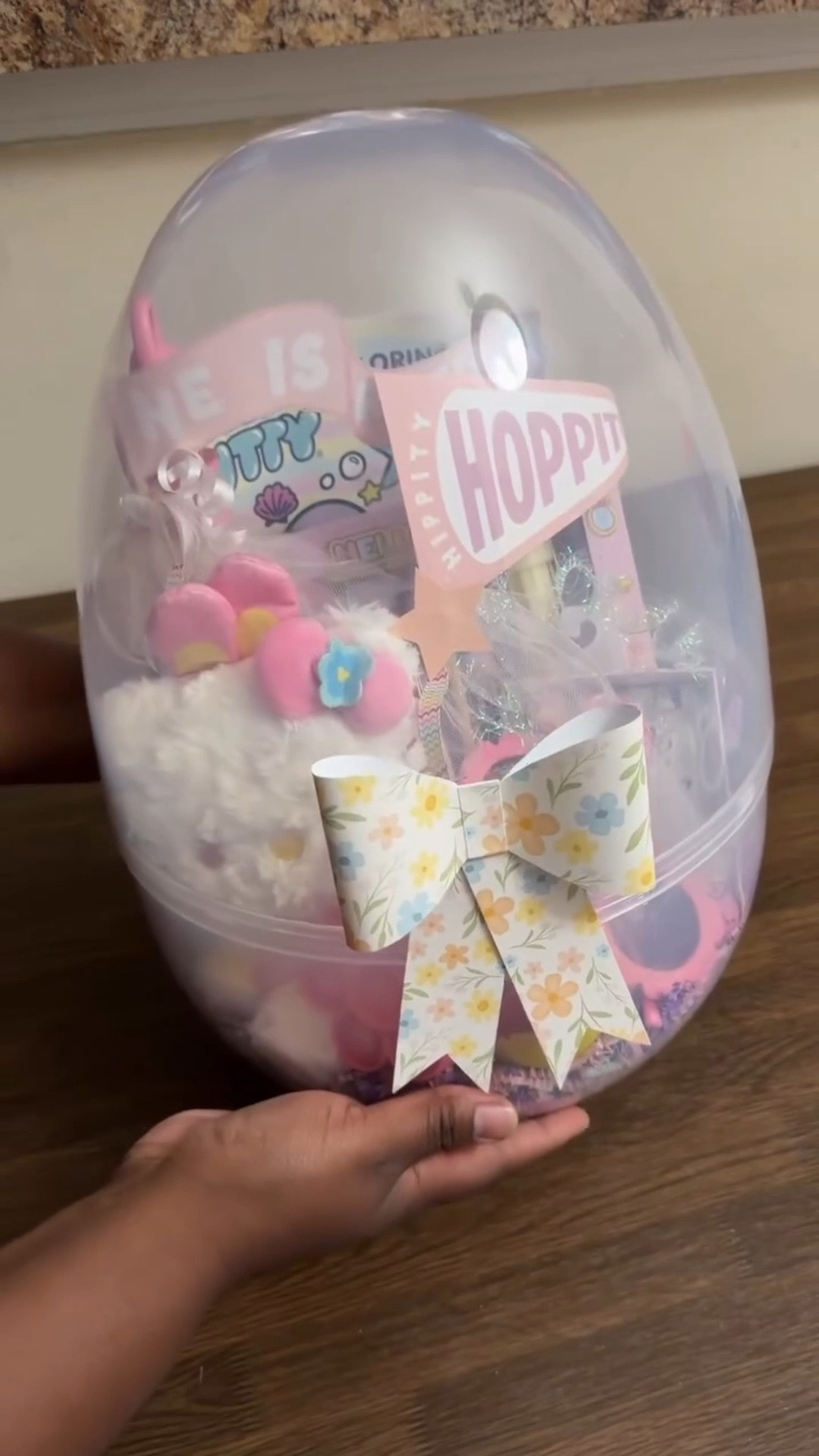 Hello Kitty jumbo Easter egg basket for my little girl ✨🐰🌷 comment EGG for a DM with the link to shop this post! 🥰 

Jor has been Hello Kitty obsessed for the past few months, so she is going to be so excited!! Added the cutest paper bows + flags from @the.lettervee ☺️

This may be my favorite DIY of the year so far 🤭 also year 2 with this $7 jumbo egg! 👏🏾

 #easter #jumboegg #kidseasterbasket #easterbasket #easterbasketideas @sanrio @hellokitty @walmart @walmartcreator @the.lettervee @skittles @crayola