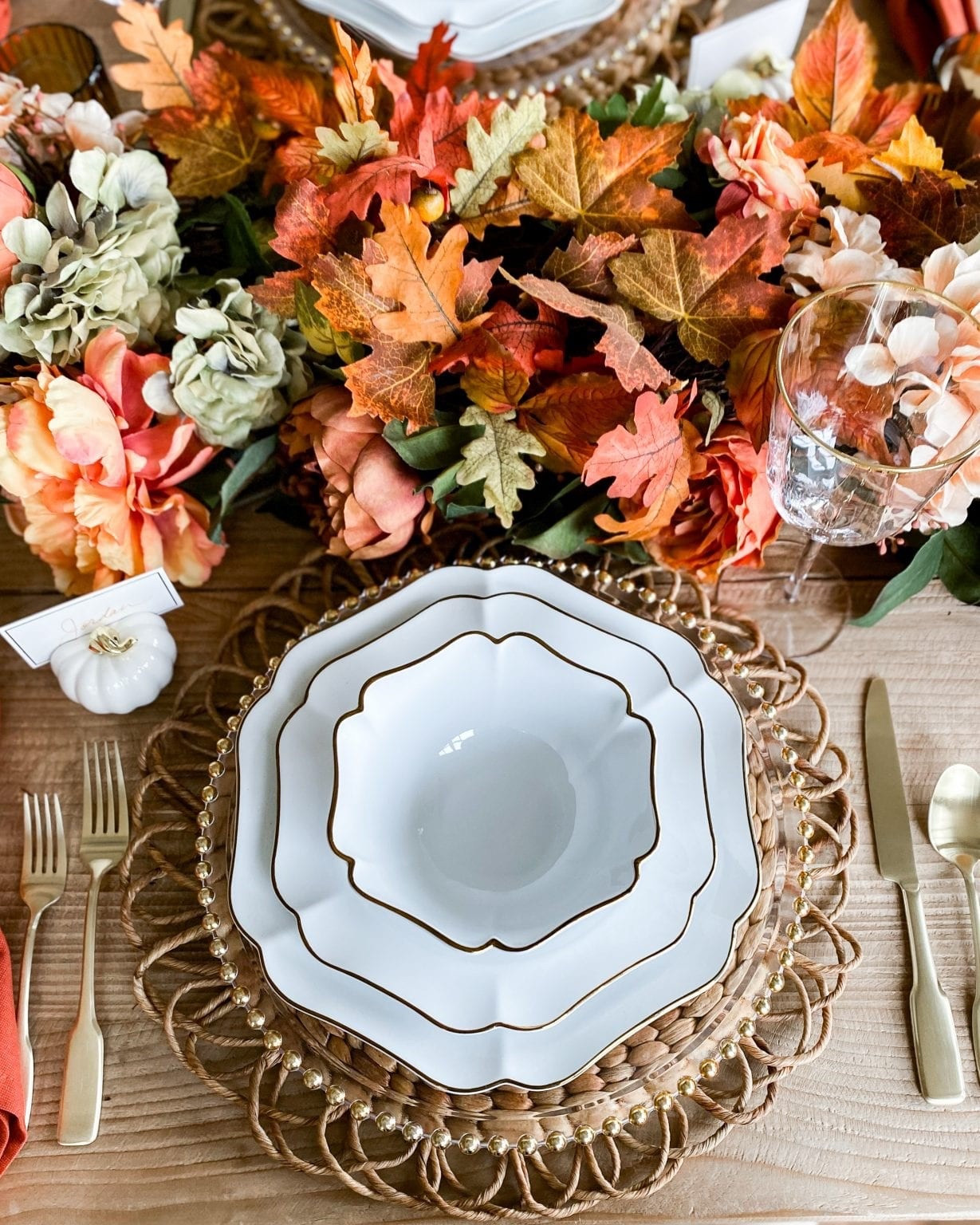 Layering is key in creating a beautiful place-setting. Here I used a woven placemat, then added the gold rimmed charger!

#LTKSeasonal #LTKHoliday #LTKHome