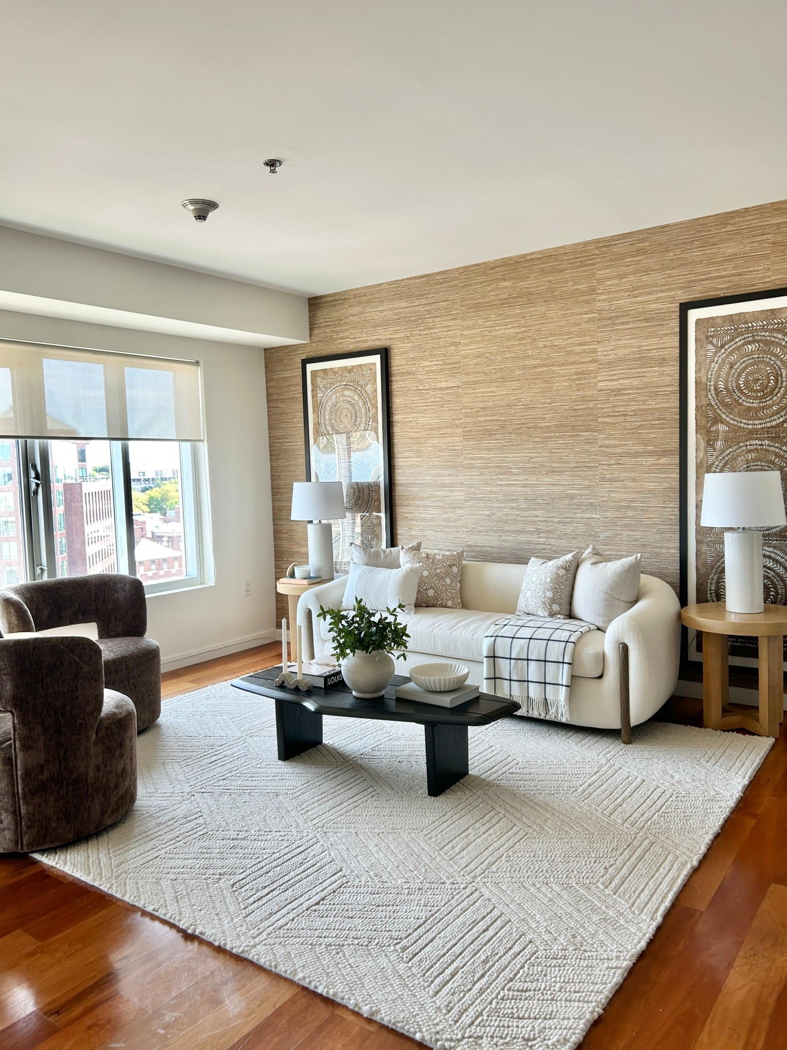 Living room filled with texture and styled with black and browns. Warm, modern yet cozy.

#livingroom

#LTKHome