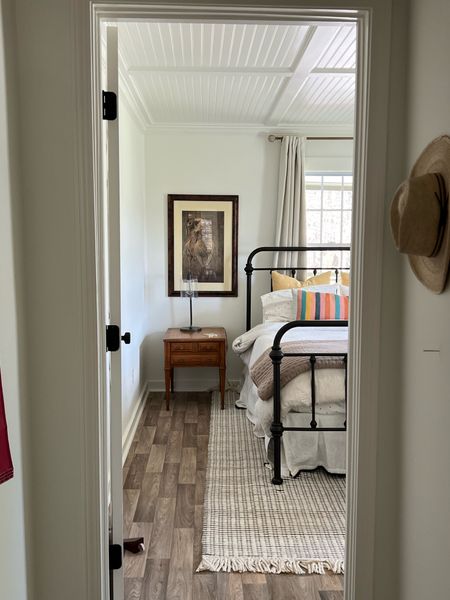 cottage bedroom iron bed cozy rug

#LTKhome #LTKfindsunder50 #LTKSpringSale