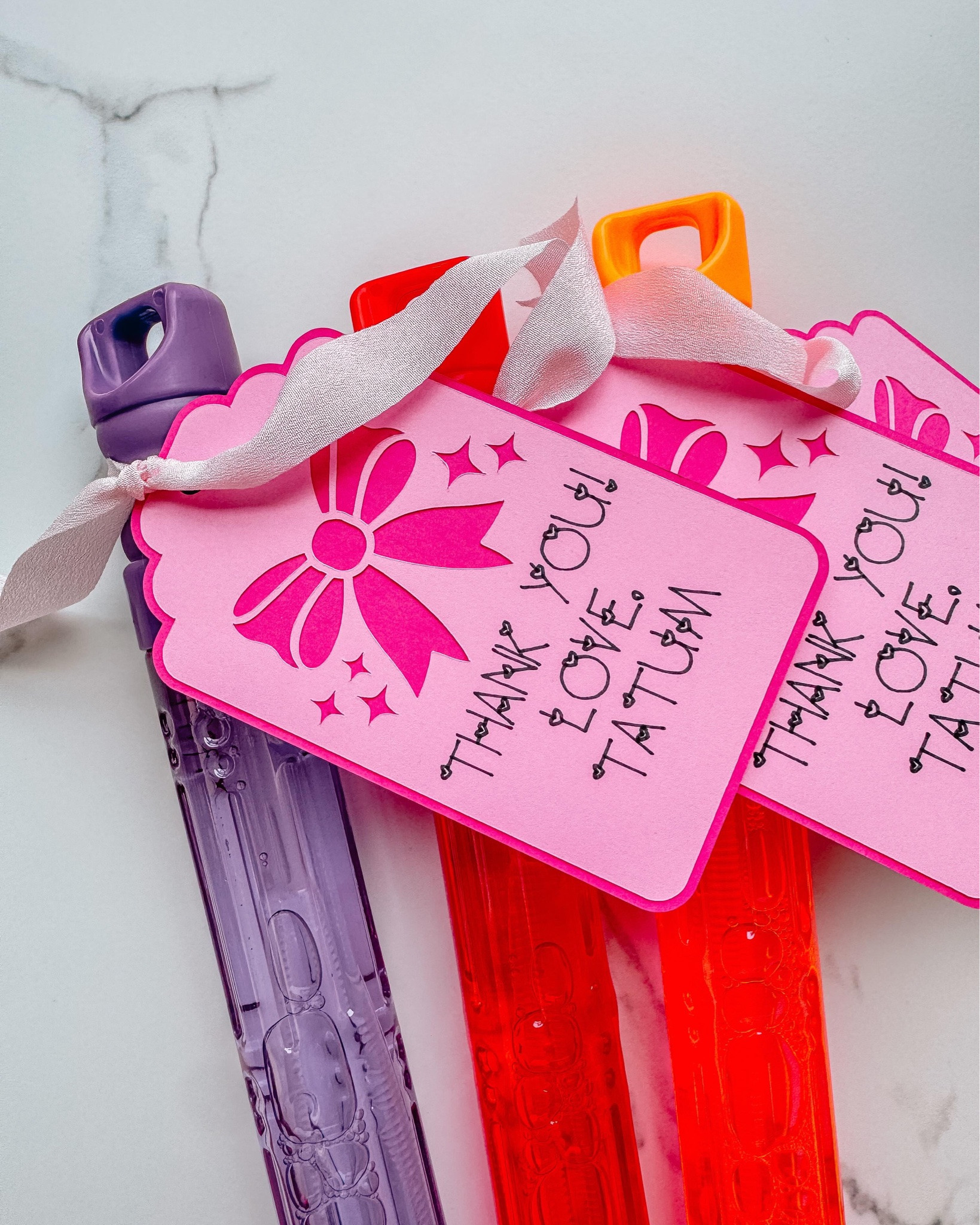 Consider this your sign not to overcomplicate party favors.

What happened to simple little “thank you” gifts like these? A package of bubbles, some ribbon, a few pieces of cardstock, and voilà—a fun, easy summer favor that doubles as a sweet thank-you for celebrating with us.

These came together so quickly and were the perfect naptime DIY. Cute, budget-friendly, and guaranteed to get plenty of use after the party.

What do you think—are simple party favors making a comeback?