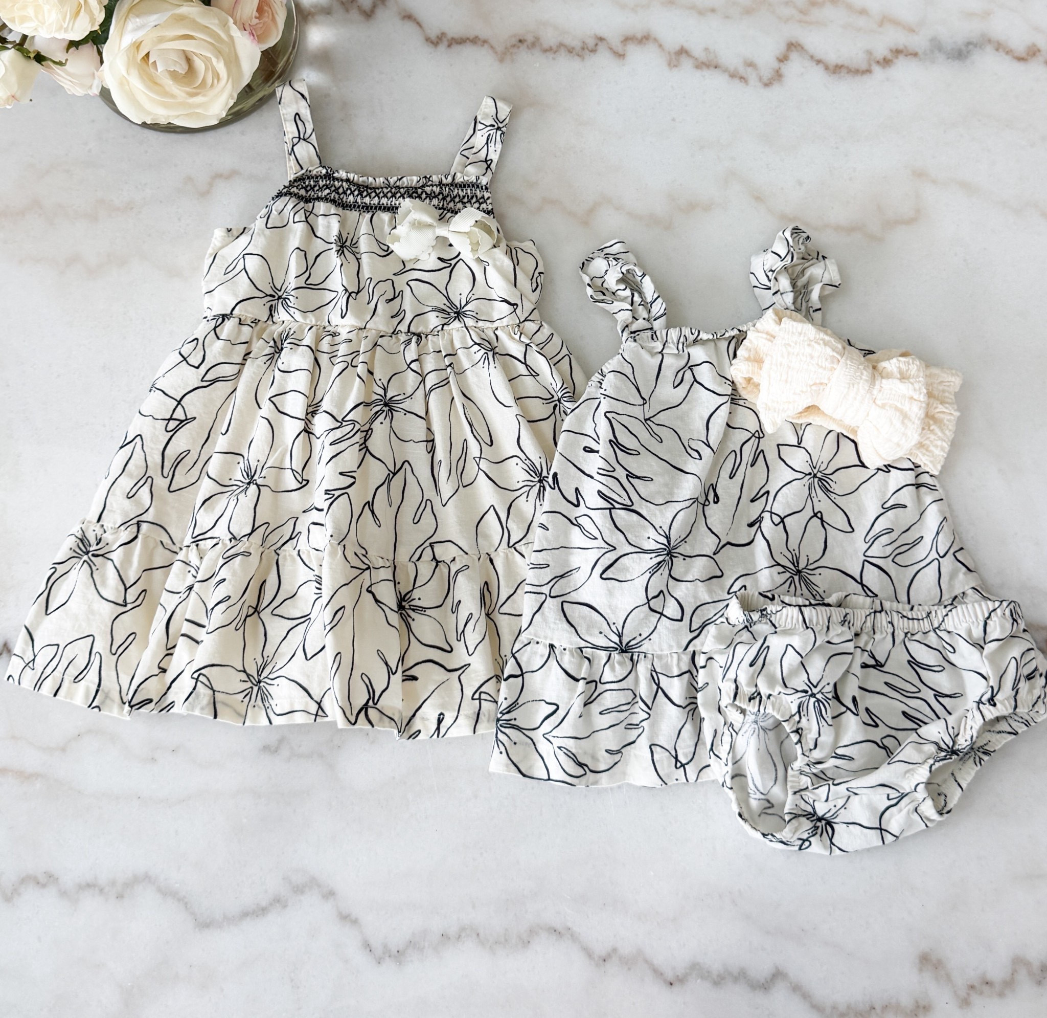 Adorable baby and toddler dresses that are perfect for vacations, summer, and daily wear! Love the black and ivory floral pattern

#LTKKids #LTKBaby