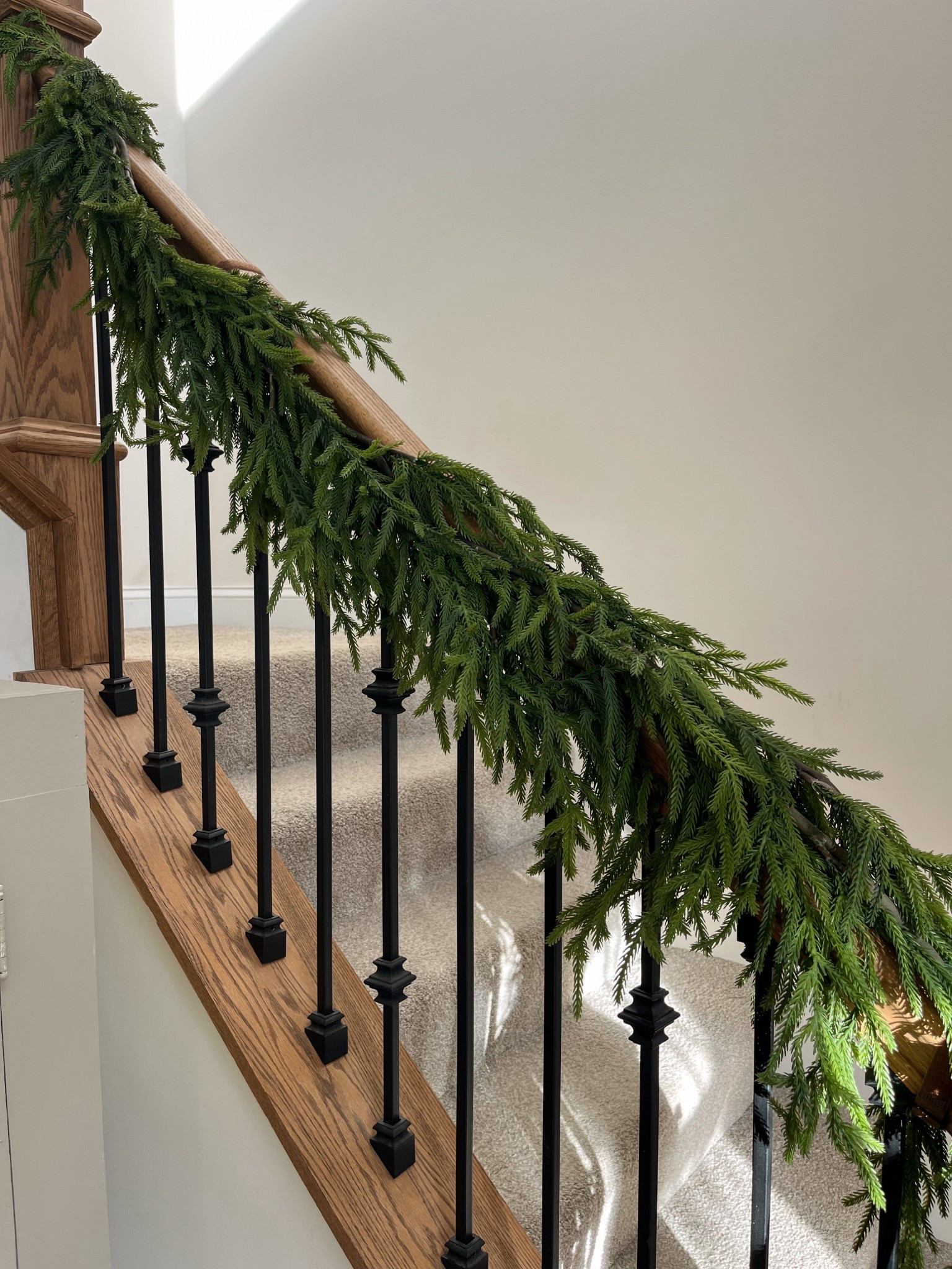 #ad #lowespartner @loweshomeimprovement realistic winter greenery garland from Lowe’s - This is two of the Holiday Living Indoor/Outdoor (non powered) Artificial Garlands, layered for a fuller look! 

#LTKHome #LTKSeasonal