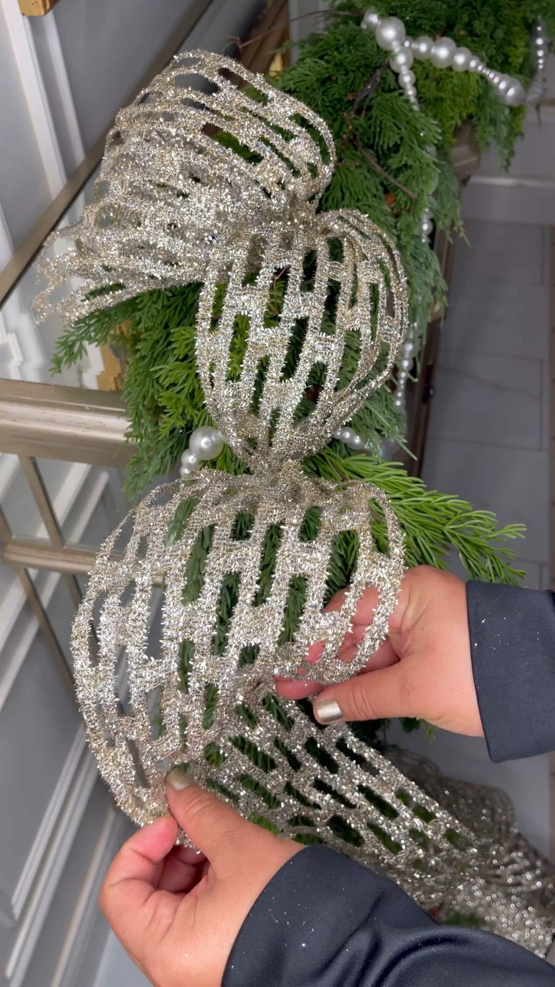 When working with a real tree or real feel stems, I use floral wire to secure the ribbon. 

Designer Ribbon
Luxe Christmas 
Ribbon Tutorial 
Silver and green
Pearls 

#LTKHoliday #LTKstyletip