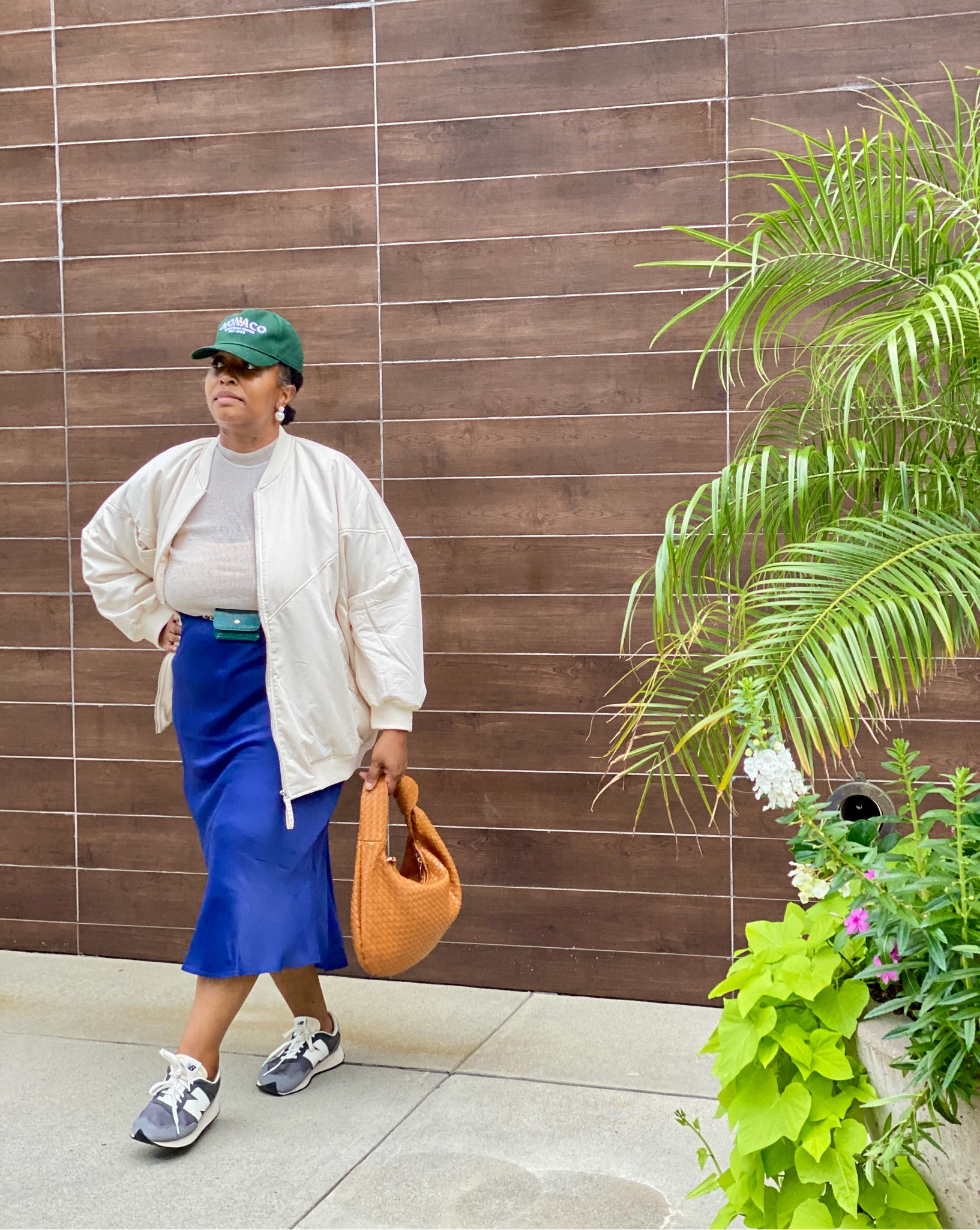 Errands to run? Wanting to feel put together but remain comfortable and stylish? Snag this slip skirt for $88 it comes in so many perfect colors. It runs large so go down a size. Also this oversized bomber jacket is a must. Don’t let it’s size fool you… it’s completely lightweight and cozy. 
Sizes I’m wearing…
Jacket- L
Mock neck- L
Bralette- L/XL
Skirt-L

#LTKcurves #LTKstyletip #LTKitbag