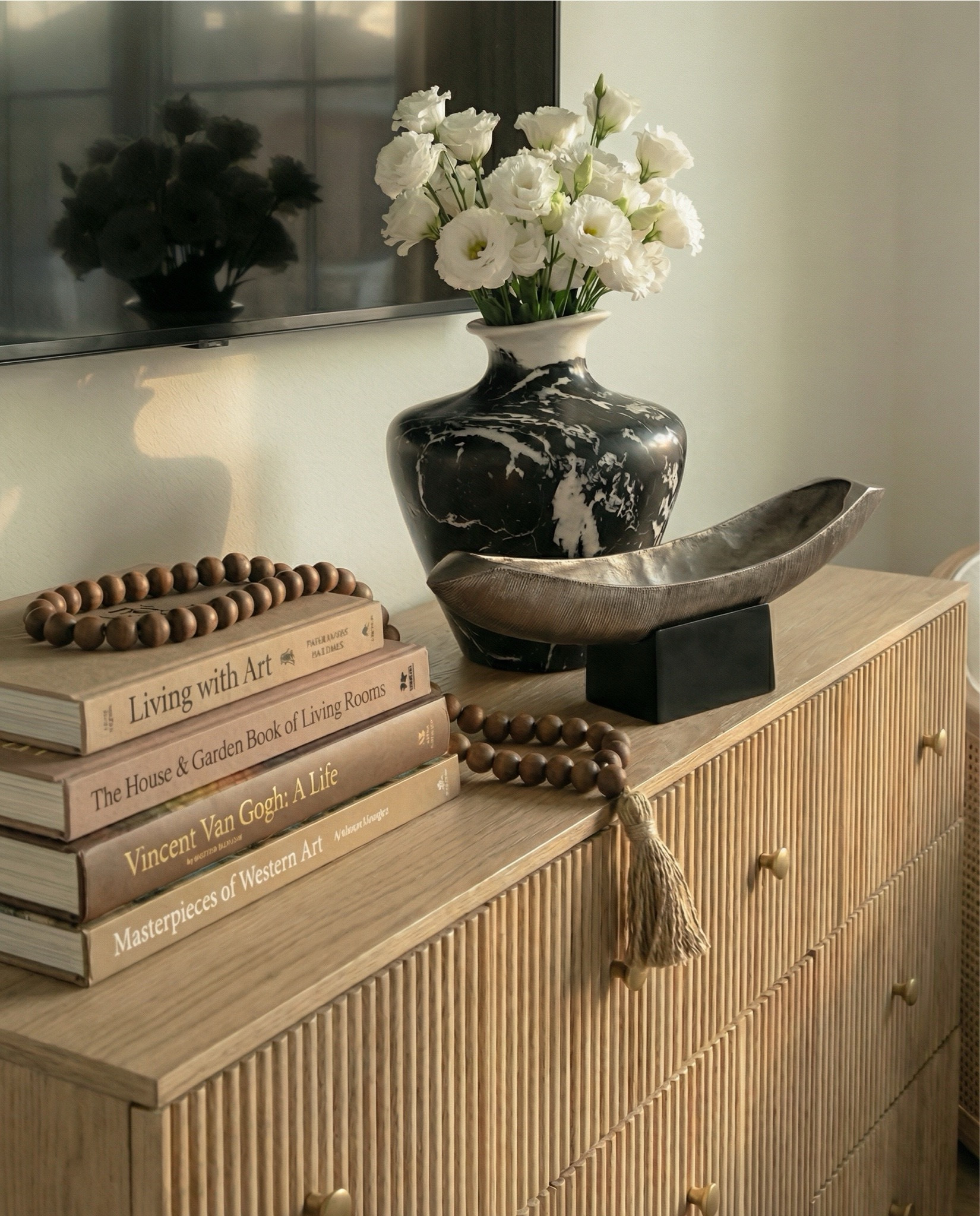 Wood canopy bed 
Brown leather upholstered bench
Brown knitted blanket
Brown throw pillows
Brown wood 3 drawer nightstands
Wall art
Glove wall lights
White tree planter
Black vase
Black table lamp
White decor bowl
Decor books
Wood dresser
Brown traditional rug 
Wood decor beads
Wood upholstered swivel chair
Wood end table
Green runner rug 
Faux olive tree 

#LTKSaleAlert #LTKHome