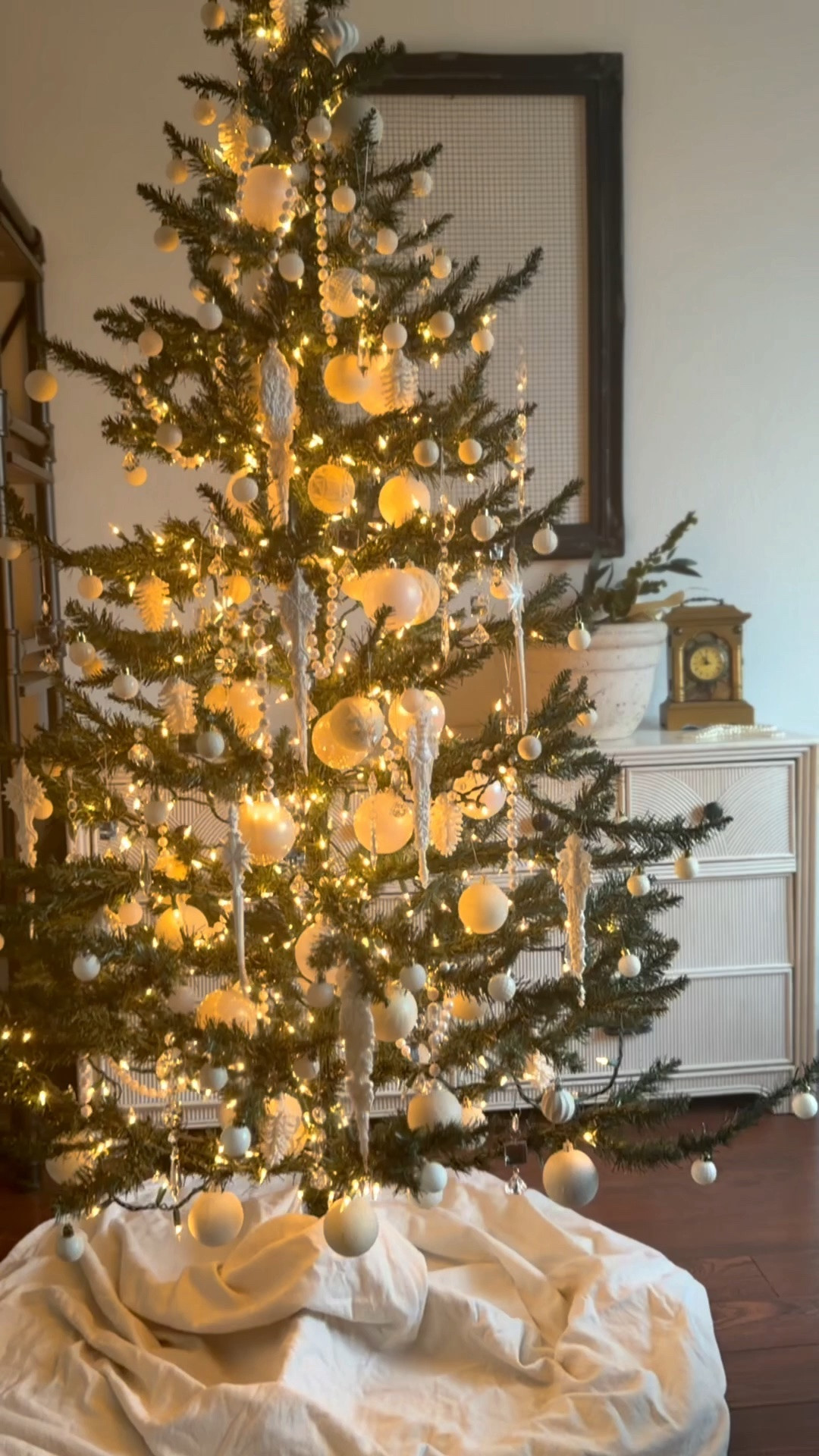 Vintage luxe, but do it yourself style. ✨

I love Leben Riebe’s Christmas trees and vintage style, and it inspired me to create my own version. ✨

I took a wire cutter to an old tree and snipped branches until it resembled an open and airy shape. Then I adorned it with hundreds of candlelight toned incandescent bulbs and layers of pearl, white and crystal ornaments. 

I truly love a good diy. ✨ the lights I used are linked, along with an LED version that gets really close to this soft golden warmth. ✨

#LTKdayinmylife #LTKstorytime #LTKSeasonal