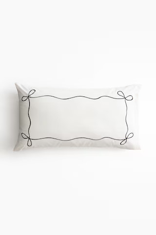 Taie d'oreiller brodée en percale de coton | H&M (FR, IT, ES, PT, BE)