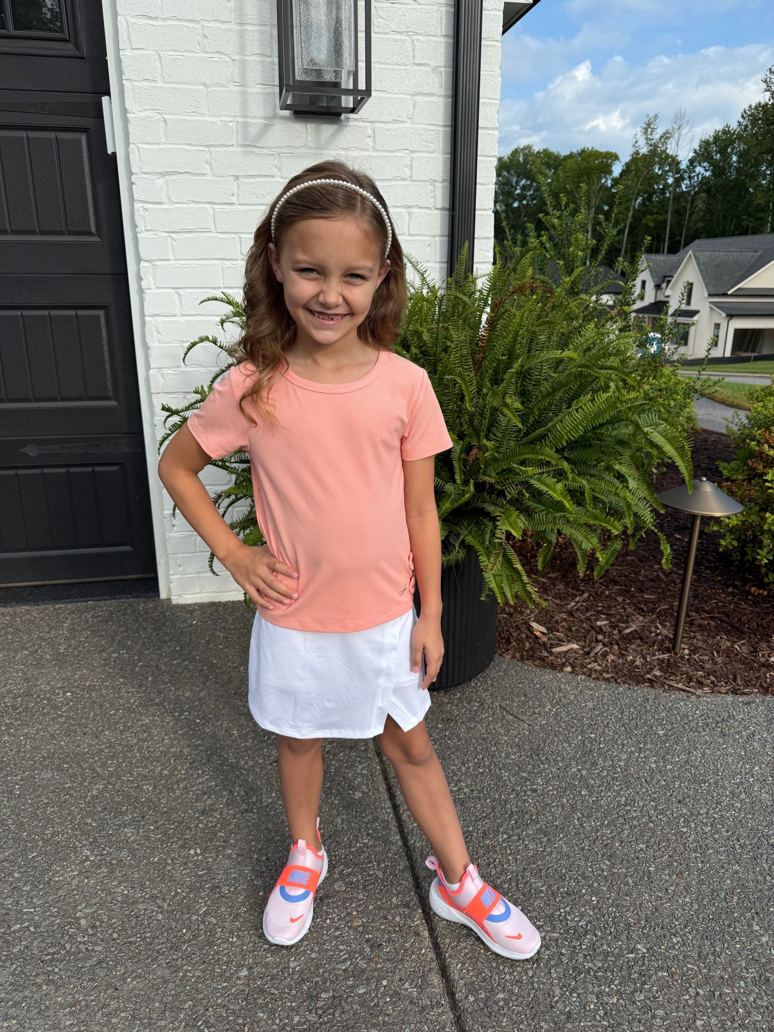 My girl is ready for 2nd grade! She loves looking cute but being comfy! She is wearing a small (7) in the skort and size small in the top.

#LTKKids