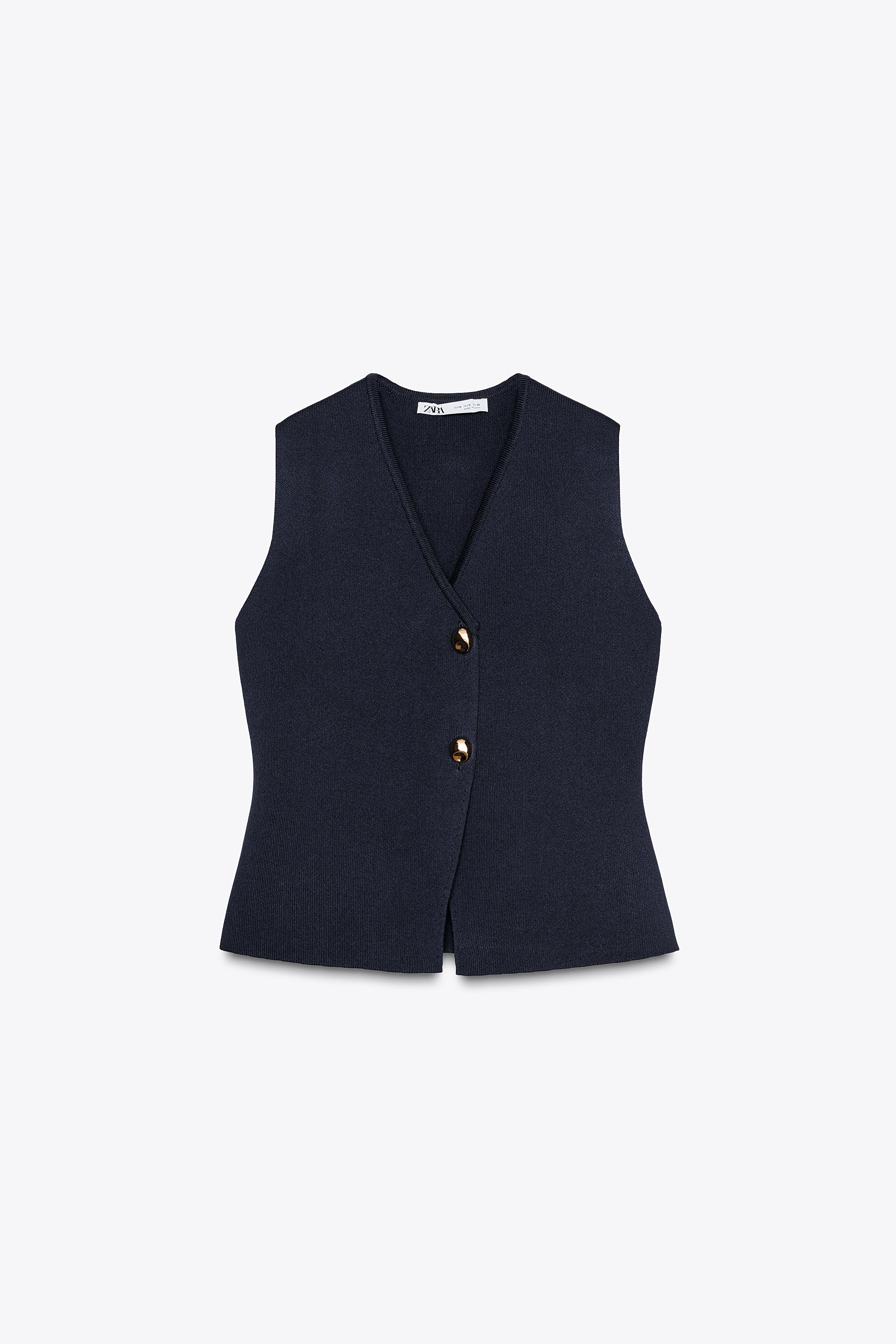 Waistcoat with a V-neckline and front golden button fastening. | Zara UK
