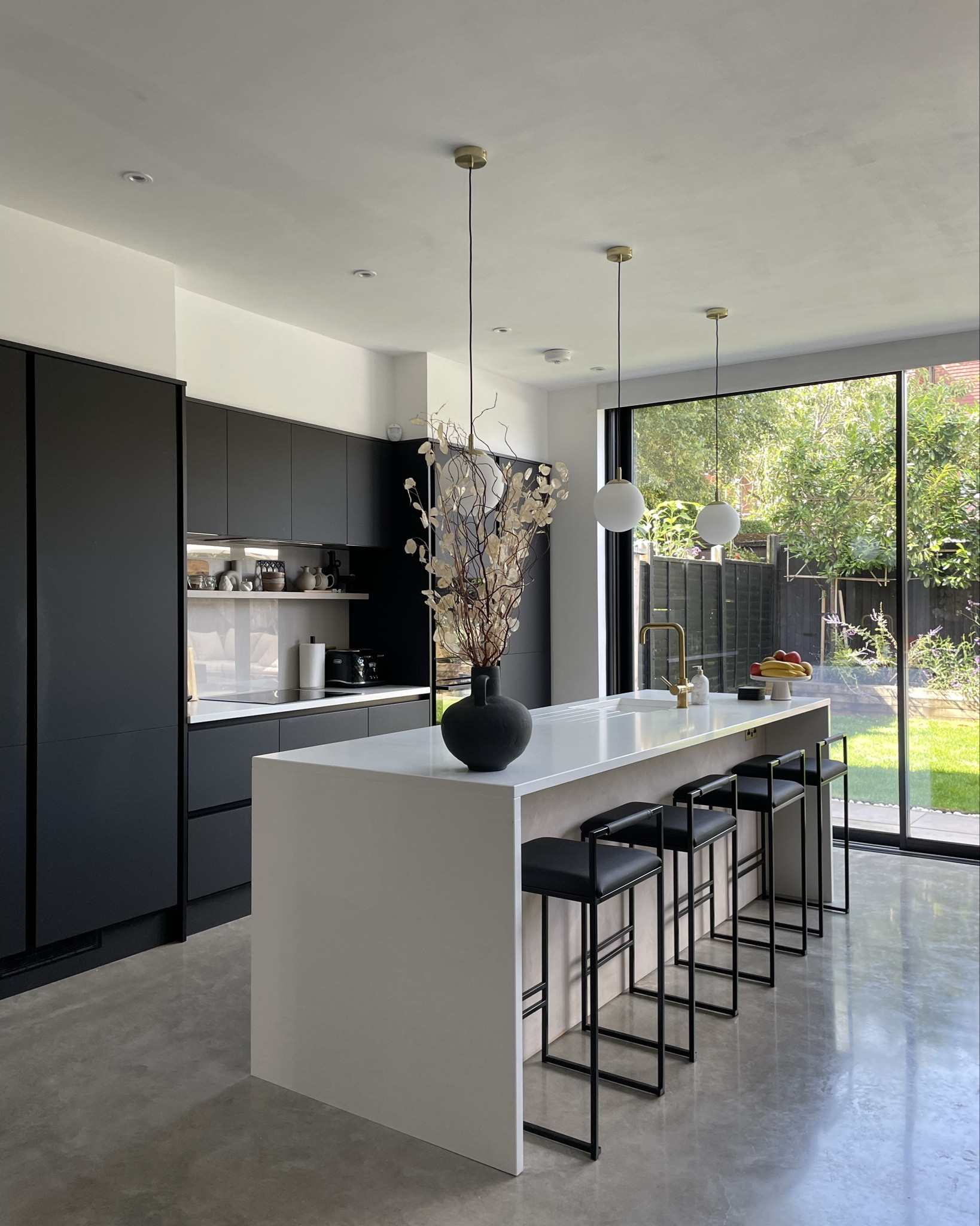 A look back at our kitchen renovation which was now a whole 5 years ago!! Where does the time go? 

What do your prefer the before or after? 

I also get asked where the bar stools are from. I’ve linked them in this post for you 🤎

#kitchenbeforeafter #polishedconcretefloors #blackkitchen #kitchenrenovation #barstools 

#LTKeurope #LTKhome #LTKuk