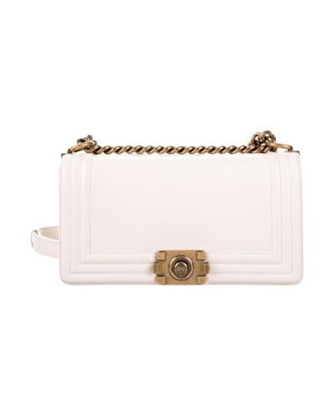 Chanel Medium Reverso Boy Bag gold | The RealReal