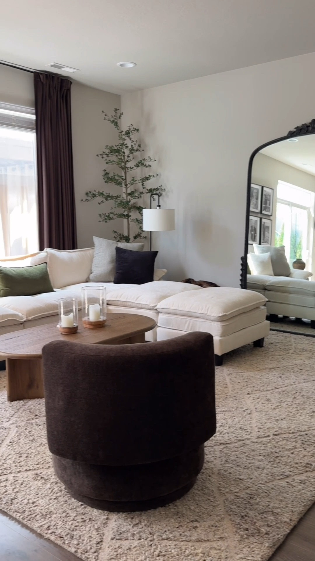 Living room details ✨ neutral, modern home. Beige, chocolate, Green. Coffee table, rug, couch, mirror, accent chair. Summer palette.￼

#LTKHome #LTKOver40 #LTKSeasonal