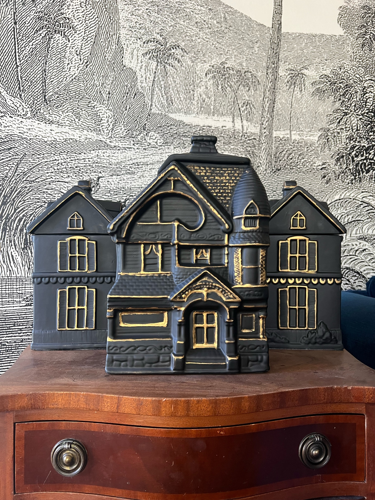 Easy and adorable Spooky House cookie jars DIY!  Vintage ceramic houses from eBay, black spray paint, and gold leaf Rub n Buff and you get these cute Halloween canisters to hide all your candy!

#LTKSeasonal #LTKHome #LTKFallSale