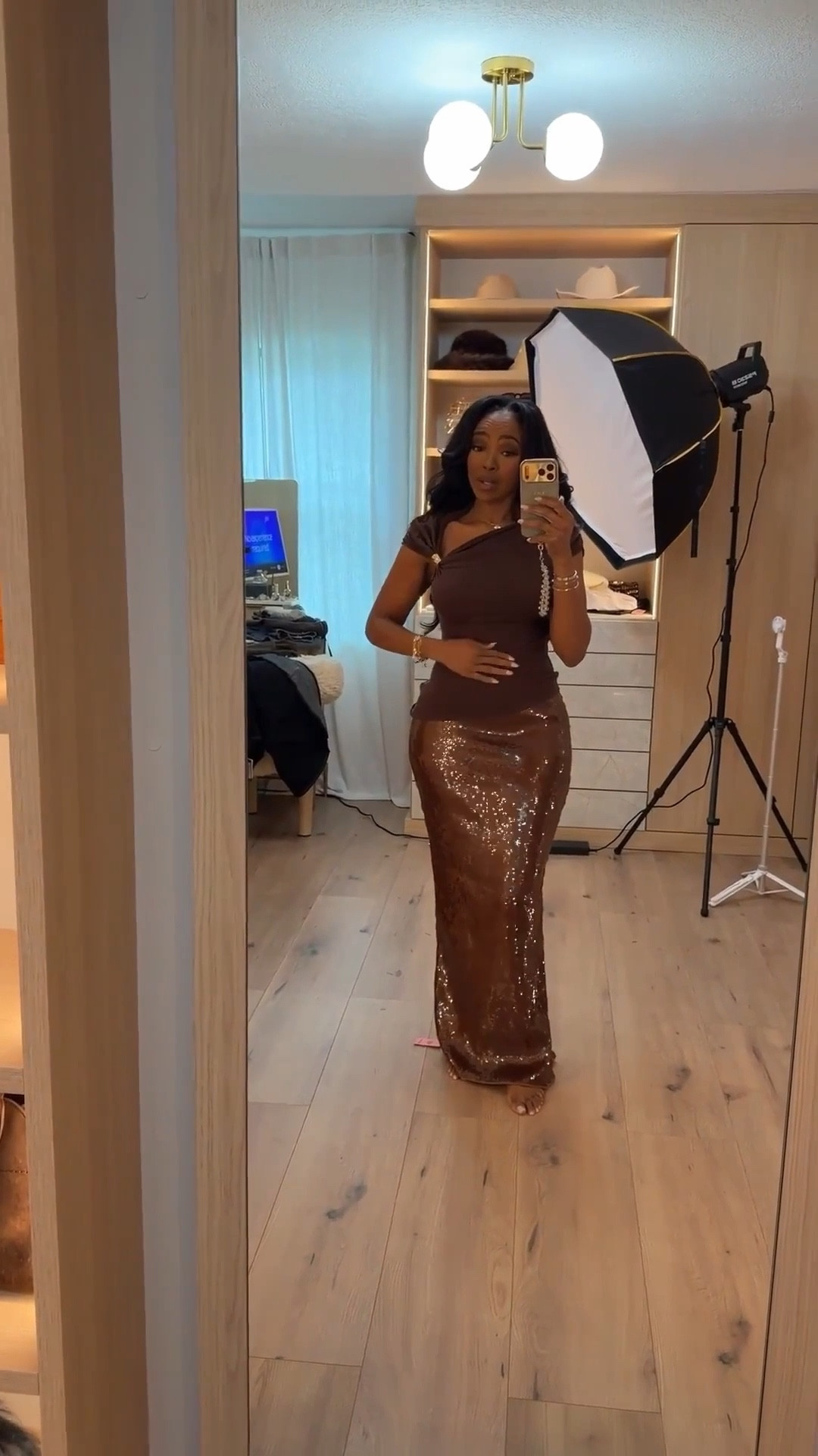 Chocolate tones + subtle shine 🤎✨  
This one-shoulder top paired with a sleek sequin skirt is the perfect mix of soft and statement. The asymmetrical neckline keeps it modern, while the shimmer adds just enough drama without feeling overdone.

Easy to dress up with heels and a clutch or tone it down with minimal jewelry — a true cost-per-wear kind of piece you’ll reach for again and again.

Perfect for:
• Dinner plans
• Date night
• Celebrations
• Dressy nights out

📏 Sizing:
Top: Small  
Skirt: Small  

Measurements:
5’4” · 138 lbs · 34D · 27” waist · 40” hips

Polished night-out looks, chocolate brown outfits, one-shoulder styling, sequin skirt outfits, elevated feminine style.

Follow me on Instagram and YouTube @kirasfashionfinds

#LTKootd #LTKgrwm