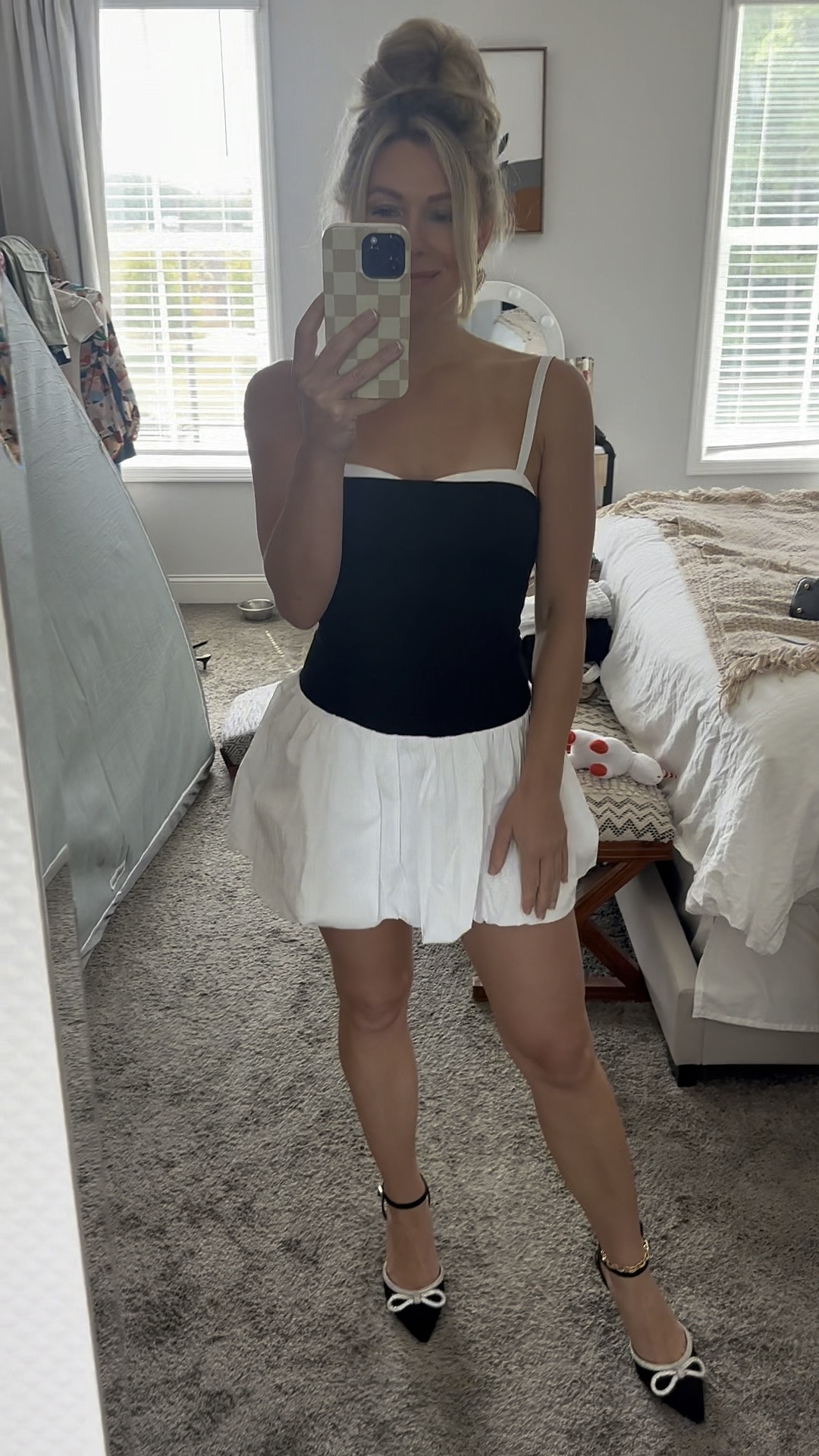 Show me your mumu drop waist black and white mini dress. So cute for a date night or event 

#LTKParties #LTKSeasonal #LTKStyleTip