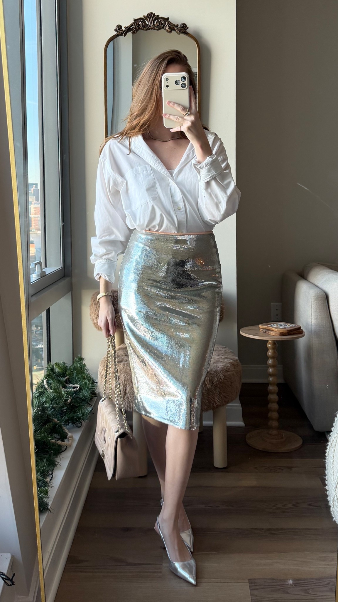 Casual & chic way to dress down your sparkly skirt for the holiday season? Adding a classic white button down! 

#LTKHoliday #LTKSeasonal