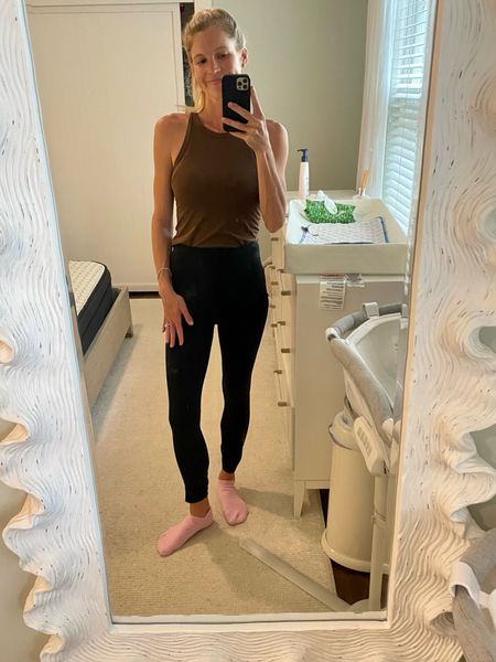 First Pilates class post baby ! Wore black leggings , a chocolate brown tank top and pink grip socks. Linked all of the above and the cute barre socks I wish I had instead 😅

Barre outfit, Pilates outfit, black leggings , brown tank top , lululemon , grip socks , workout outfit , cute workout look

#LTKFitness #LTKunder100