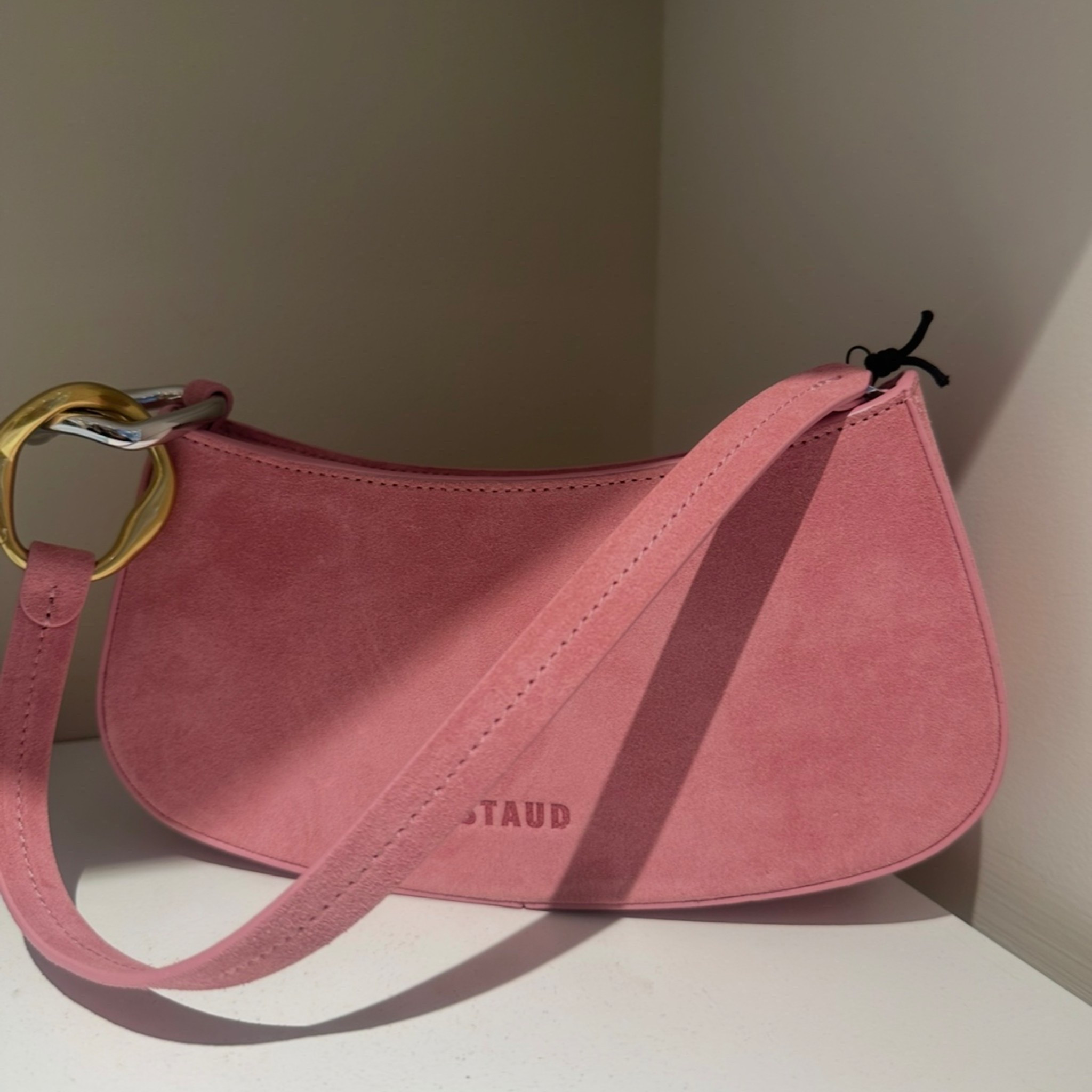 The Staud bags are super chic and cool at a great price. 
