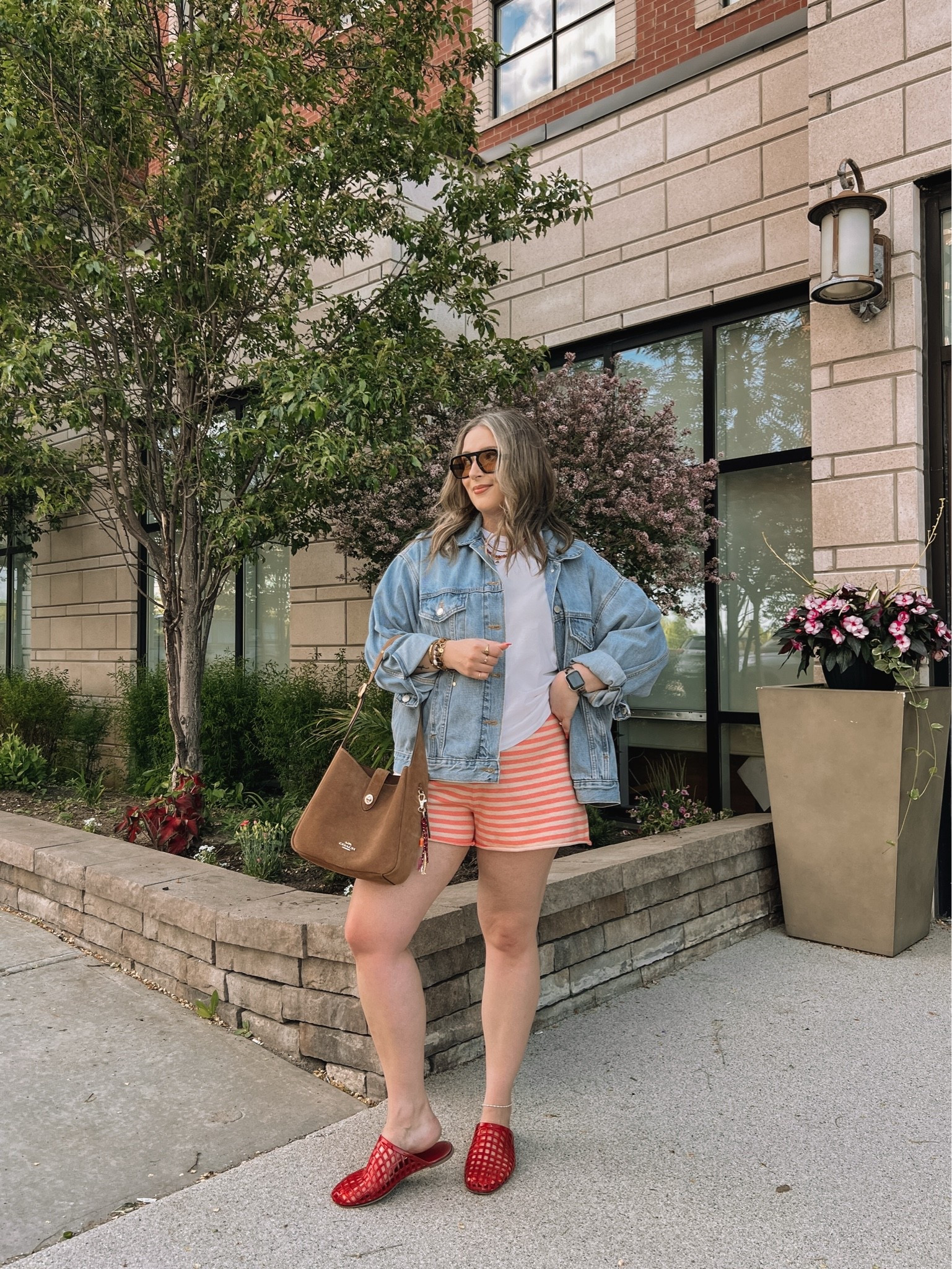 Comfy spring to summer outfit! Wearing my usual L in the striped knit shorts. Sized up to XL in the denim jacket for an oversized fit. Linked similar white tees. Jelly shoes are quite comfy, I’m a 9.5-10 and wear a 10. Canadian shoe link under “similar products”

#LTKsummer #LTKmidsize #LTKstyletip