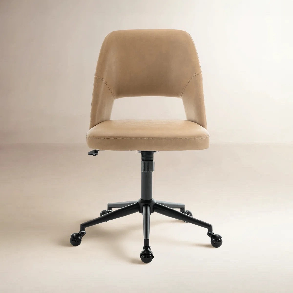 This modern office chair from Wayfair is perfect for creating a clean and functional workspace 🪑✨ Featuring a faux leather upholstered seat, adjustable height, and smooth swivel base with rolling casters, it’s designed for everyday comfort while working, studying, or getting ready. The armless design makes it easy to tuck under your desk and save space—perfect for home offices or small work areas. 