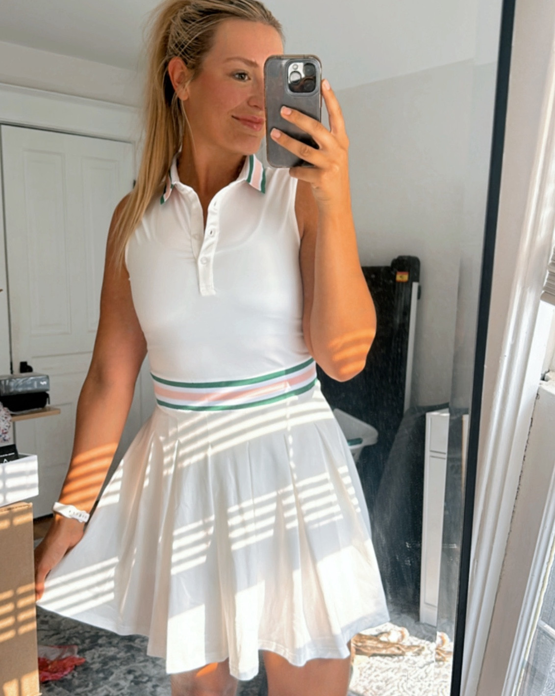 This white golf dress is everything!!! The green and pink stripes are a perfect touch. Even comes with shorts underneath! The waistline is so cute and flattering just WOWWWW!! Wearing a medium here🩷💚💕 absolutely love this dress from Amazon. Will be ordering in multiple colors! 

#LTKFitness #LTKActive #LTKFindsUnder50