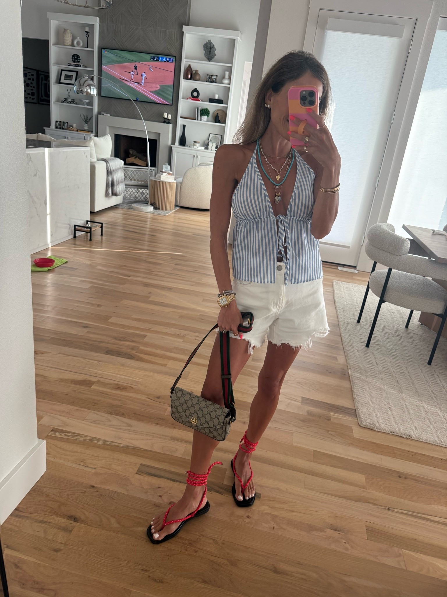Sunday date night casual summer outfit wearing this stripe halter top and white denim shorts in size 23 and trending red rope lace sandals and my new Gucci bag

#LTKPetite #LTKootd #LTKSaleAlert