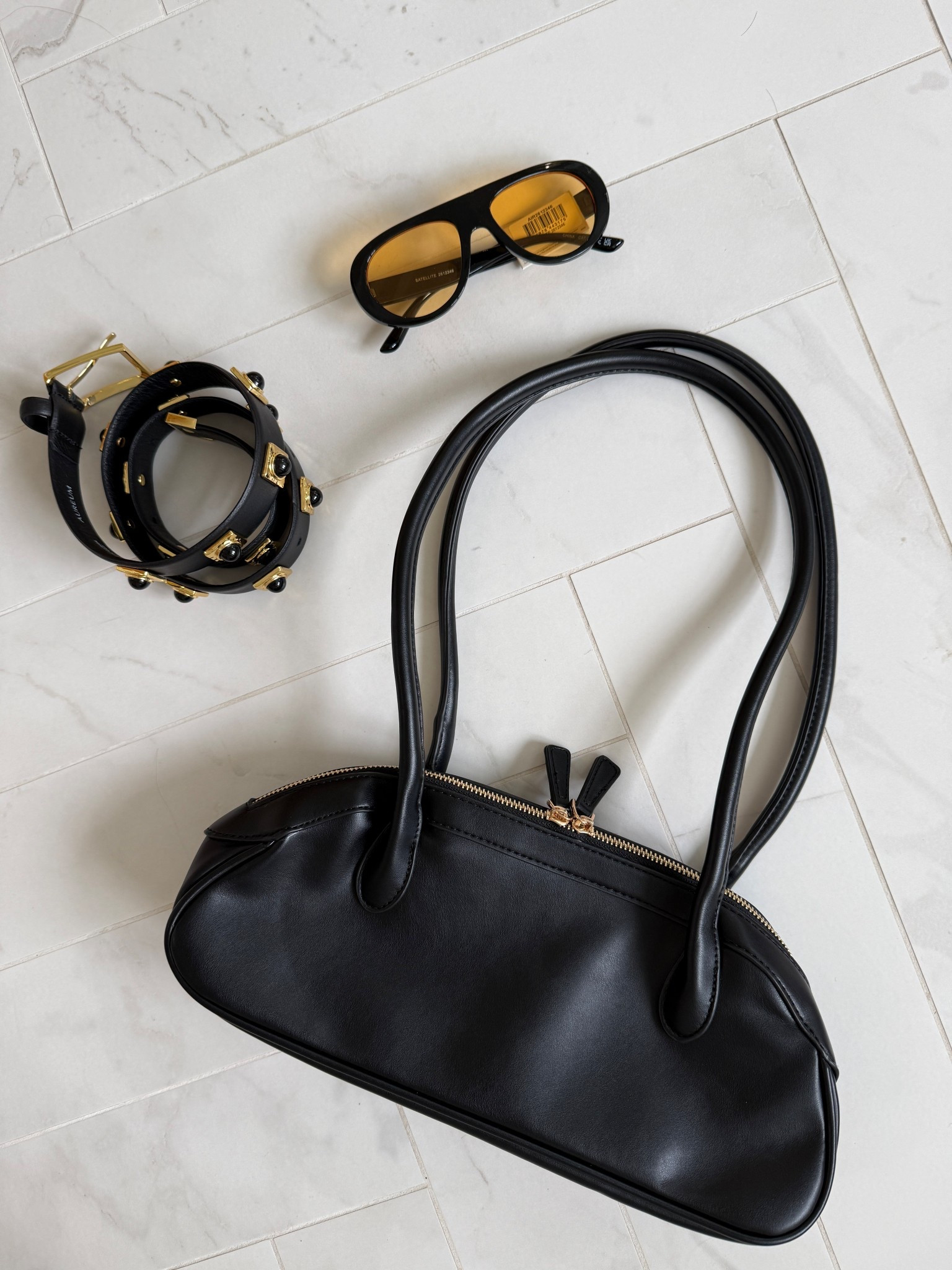 Black accessories just do it better. Black bag, black belt, black sunnies, instant polished look with zero effort. 🖤

#LTKTravel #LTKSeasonal