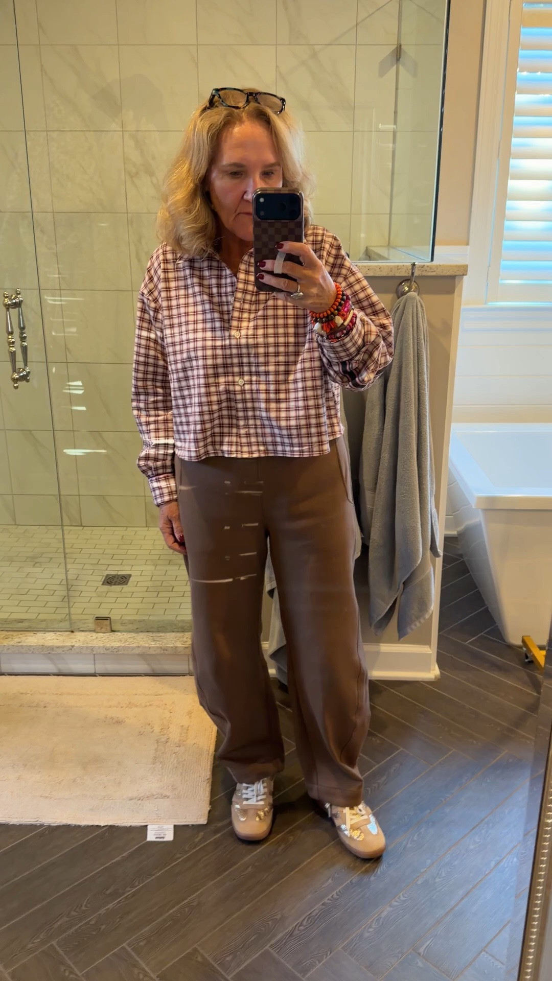@ruti pant is a heavier ponte knit it’s a really nice fabric. Since they don’t come in appetite, I am going to hem them because I like this barrel a little bit shorter like right up my ankle. I’m wearing an eight.
Top is sold out in this color, but I noticed there is one color available and on major sale size down