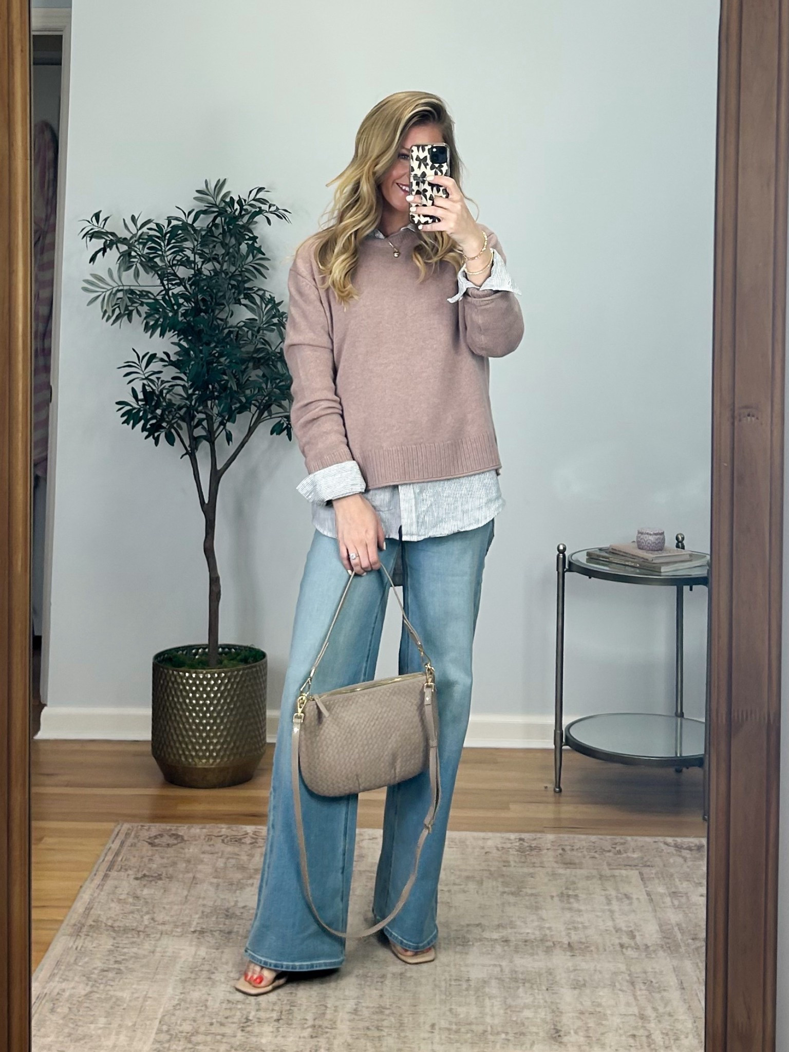 Spring outfit! Love this Mongolian cashmere boxy sweater (size M) paired with the Bella wide leg stretch jeans (size 27-32 length) 5’5” for size reference. Layered my linen button down underneath!

This purse is a beautiful Italian handwoven leather and it’s the perfect size! 

#LTKSaleAlert #LTKSeasonal #LTKootd
