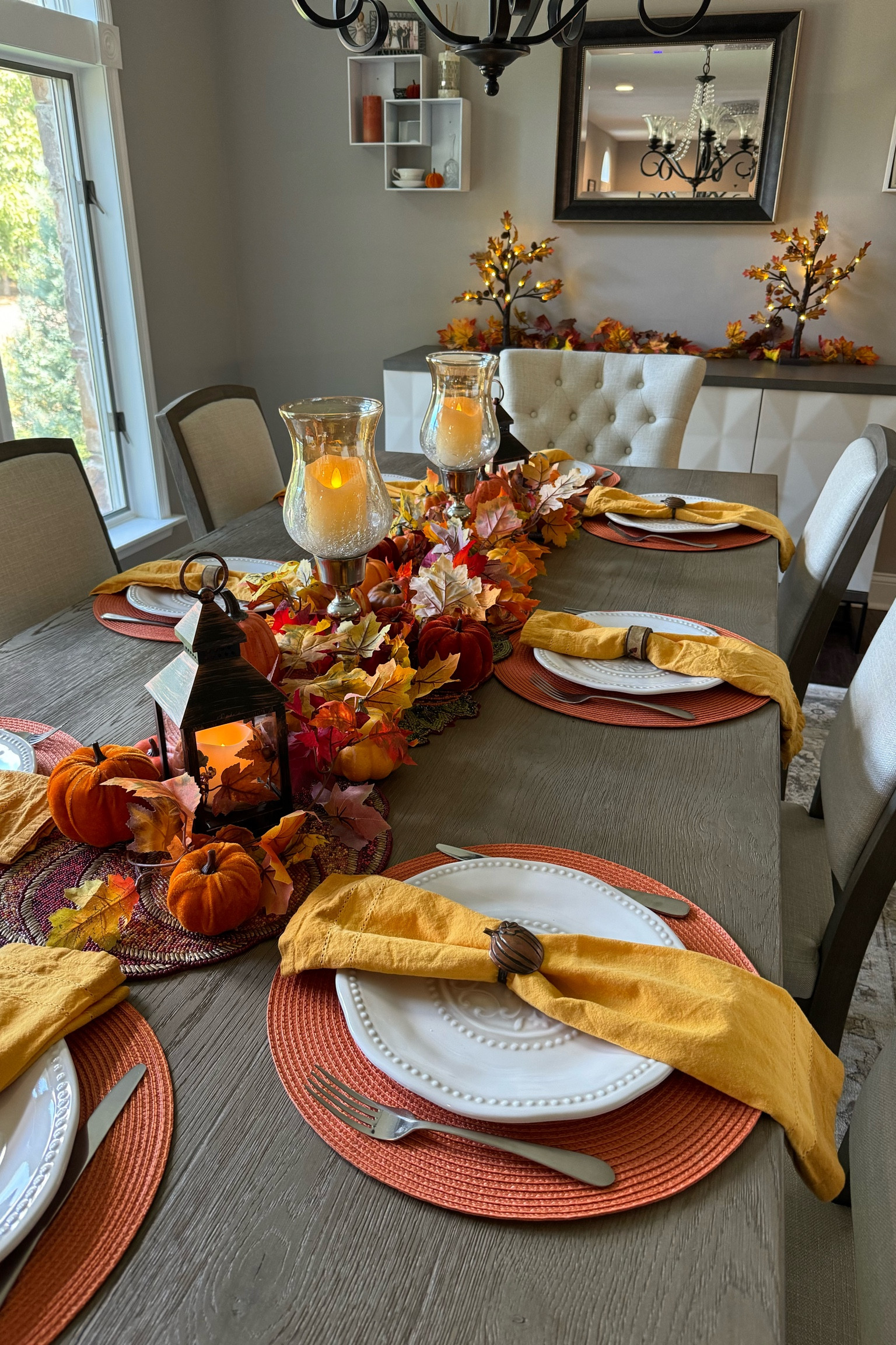 Fall tablescape, fall table runner, pumpkin napkin rings, fall napkin rings, fall dining room, fall place settings, yellow hemstitched napkins, orange placemats, woven placemats, fall lanterns, fall decor ideas, fall decor inspiration, fall tablescape, fall home decor, fall dining room, dining room table, Pinterest dining room, styled dining room, decorated dining room, seasonal dining room, fall led candles, fall led lanterns, fall placemats, fall table runner, fall decor inspo, decorating inspo, dining room inspo, pottery barn dining room

#LTKStyleTip #LTKHome #LTKSeasonal