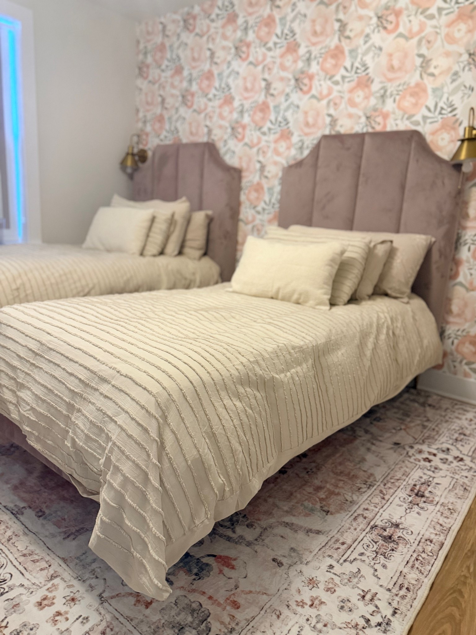 Update on my daughter’s bedroom.
I wasn’t loving how the bed frame and the wallpaper looked together so I bought a rug with all the colors to help create some harmony and I’m so happy with the results! 

#LTKHome #LTKKids