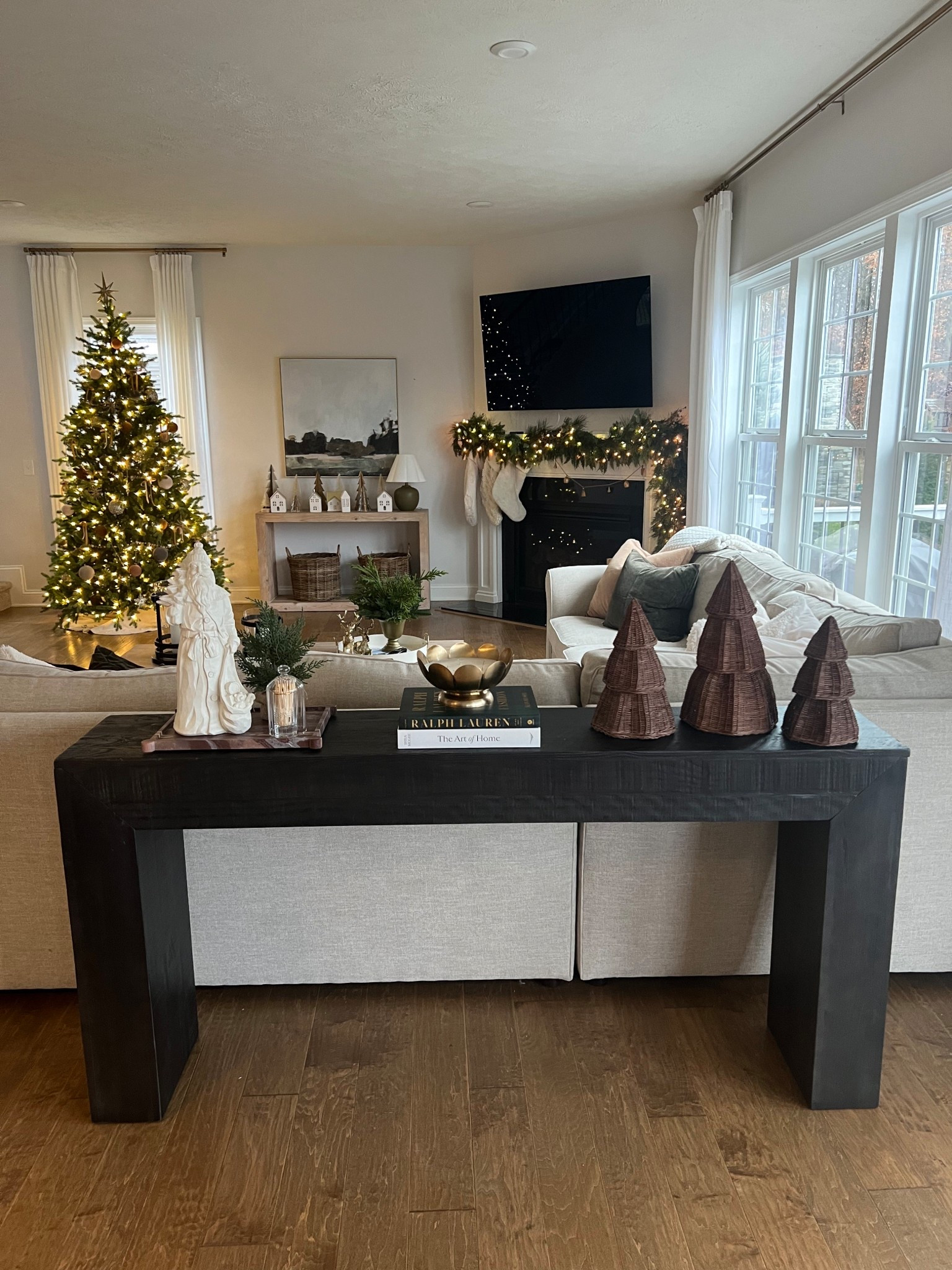 Always looking for new places to add touches of Christmas ✨ This beautiful Camden console table by @plankandbeam is the perfect addition to help complete this cozy space. 

We love the high-quality feel and rich texture, and it took less than 5 minutes to put together, which is a huge win during the hectic holiday season! #plankandbeam #ad

#LTKHome #LTKSeasonal #LTKHoliday