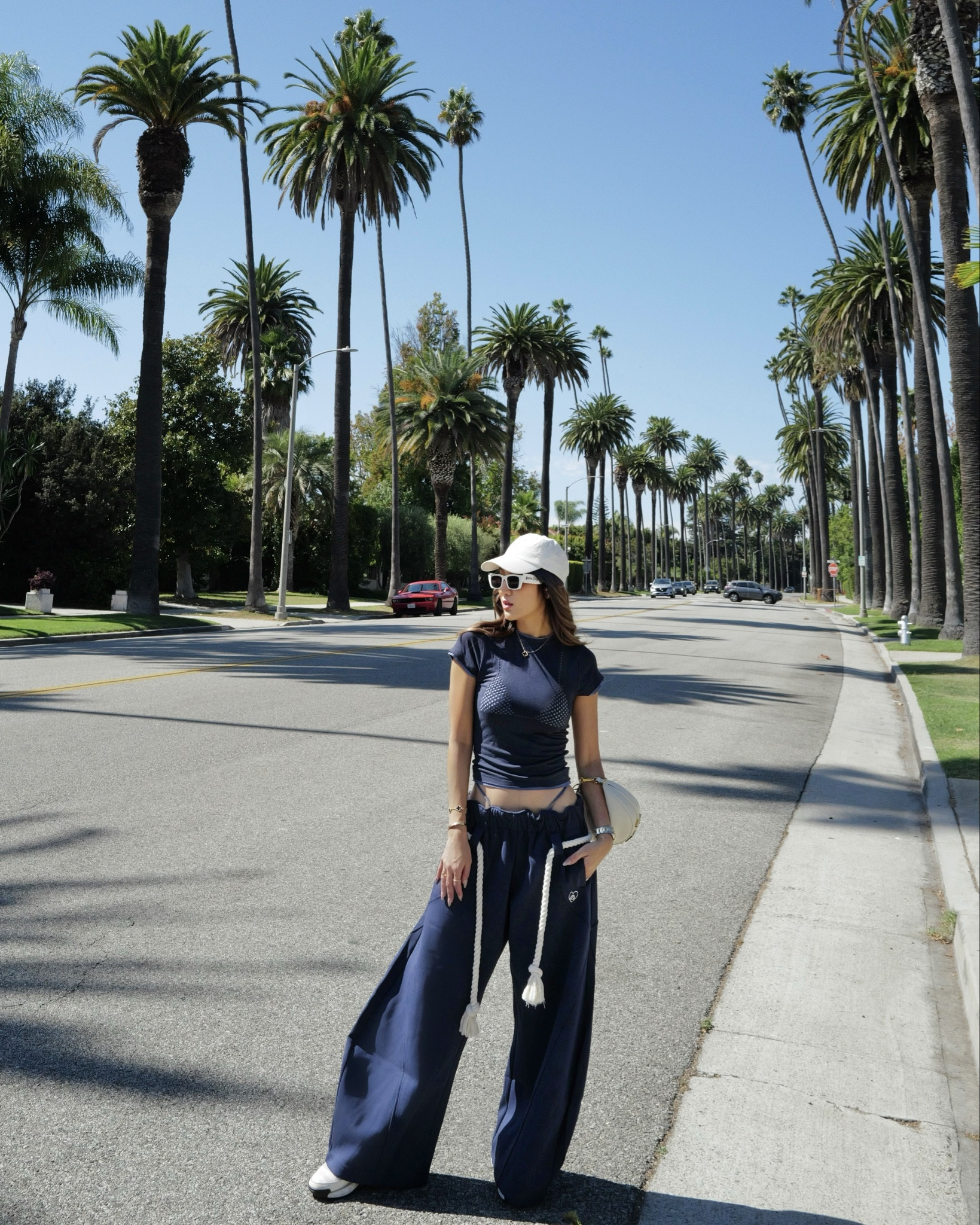 🌴 West Coast mood: ON 💙👟✨
Style is the story you tell without words—today, mine speaks LA. 👙🌴

#WestCoastVibes #BeverlyHills #WestCoastMood #OOTD #StreetStyle #KeriiKingTravel 

#LTKSeasonal #LTKStyleTip #LTKTravel