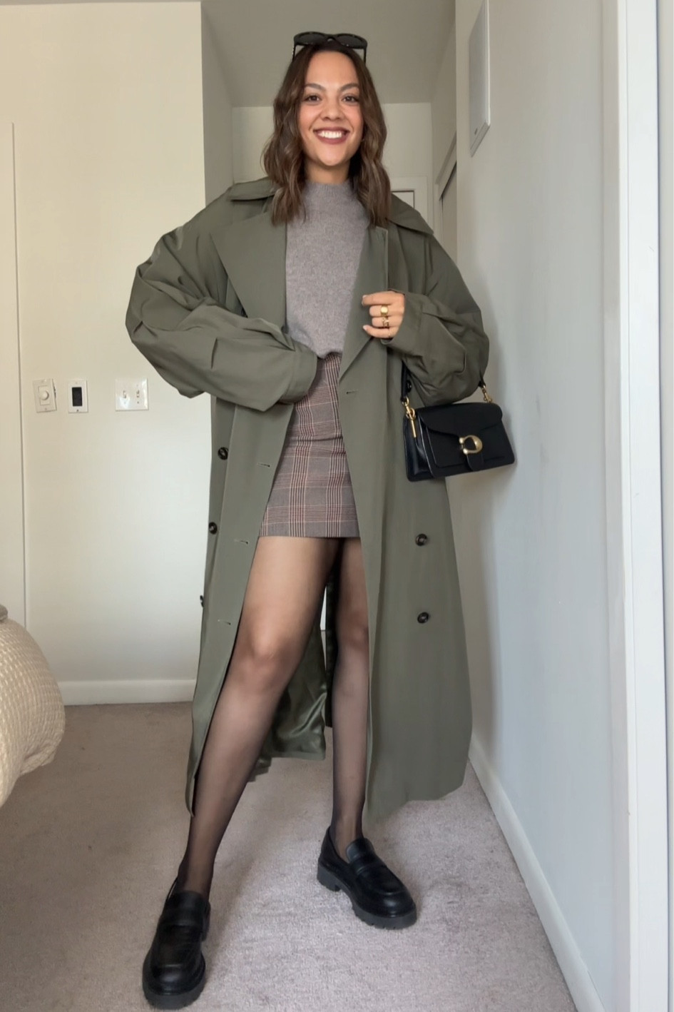 Fall outfit inspiration

-Reformation taupe wool sweater, I have a size large.
-Plaid mini skirt, similar linked.
-H&M sheer black tights, I have a size large.
-Poppy Barley black loafers.
-Coach tabby shoulder bag in black pebble leather.
-Olive green trenchcoat, similar linked.
-Celine Triomphe sunglasses  

#LTKcanada #LTKstyletip #LTKautumn