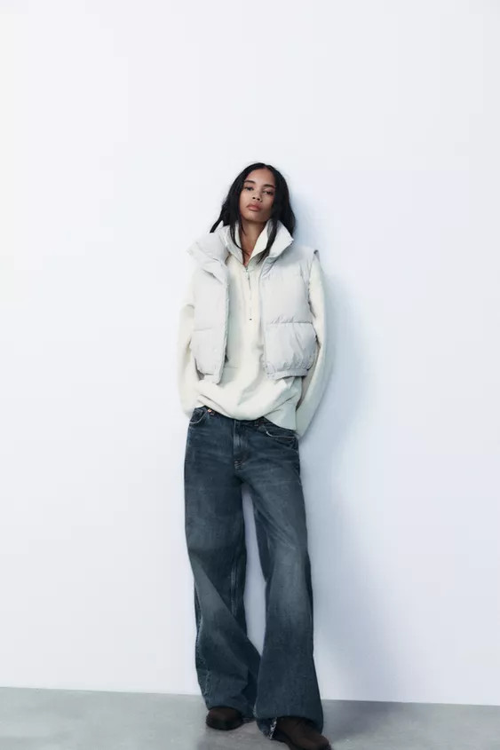 Sleeveless high collar crop vest. Hidden side in-seam pockets with fleece lining. Adjustable elas... | Zara US