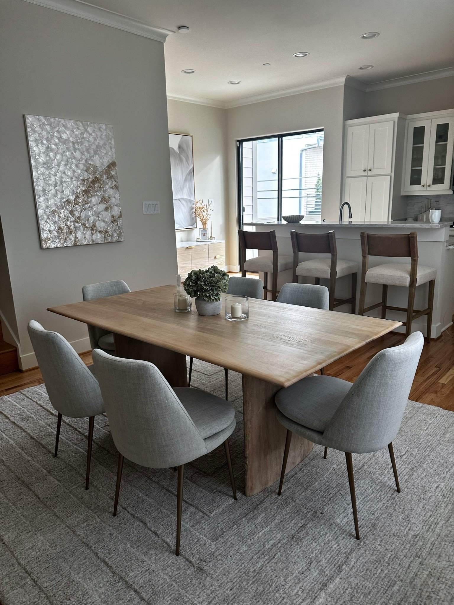 Neutral heaven in the heart of the home. My dining table, chairs, and bar stools are all West Elm—and yes, they’re as comfy as they look.

 #NeutralInteriors #WestElmStyle #DiningRoomGoals #ModernOrganic #HomeVibes



#LTKHome #LTKStyleTip