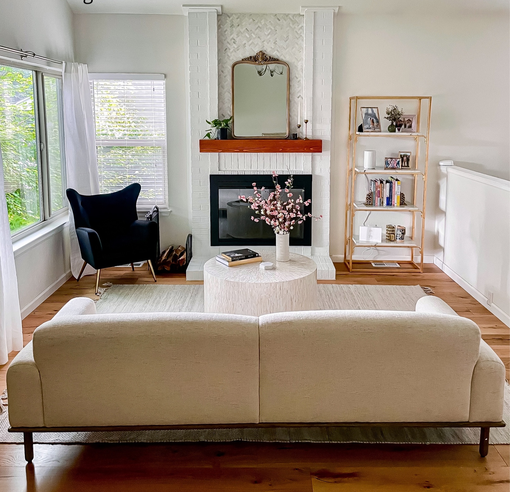 Formal living room update with white brick fireplace, new mantle, hardwood floors and neutral furniture 

#LTKfamily #LTKstyletip #LTKhome