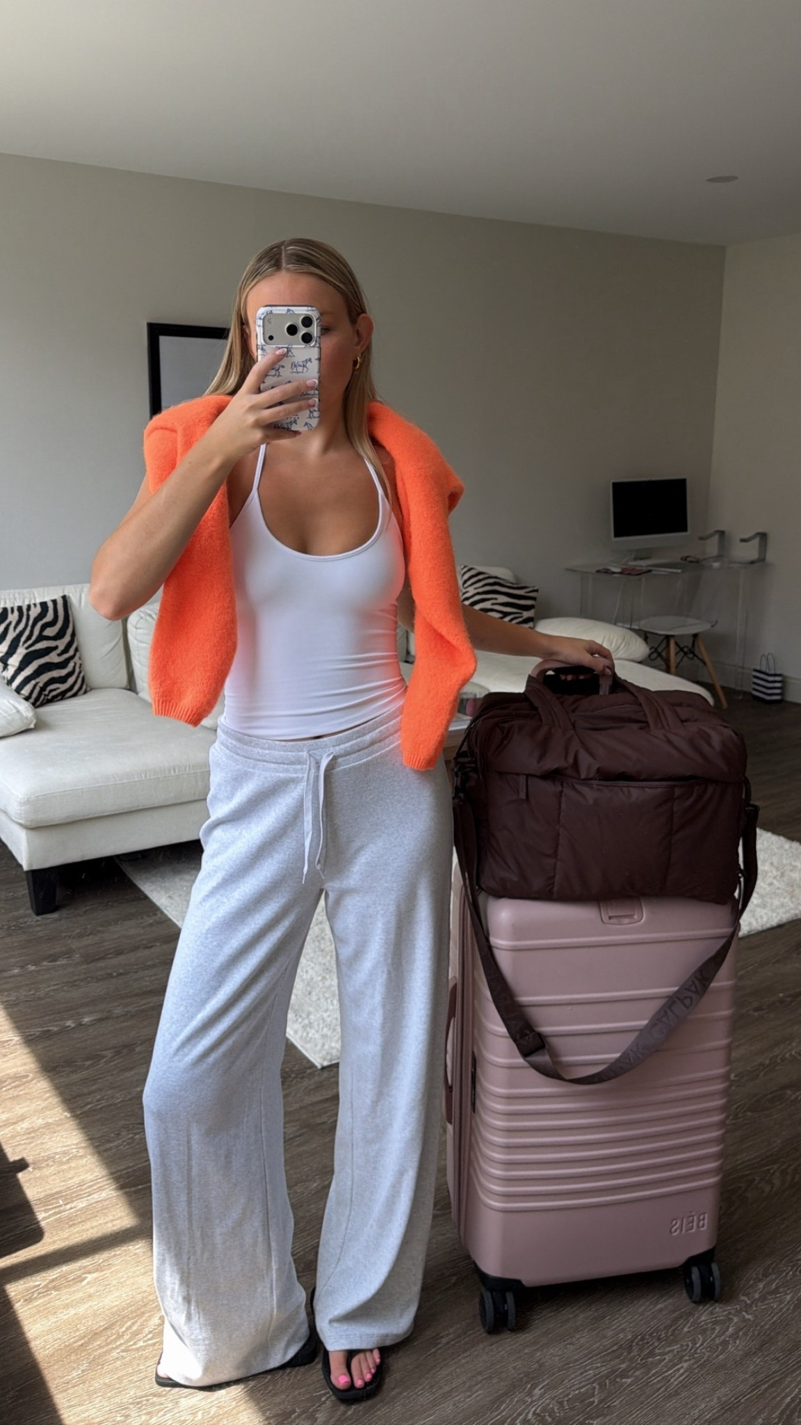 Airport ootd!! Wearing a medium in the pants and color is heather cloud white! Tank and sweater are not linkable but linked similar

#LTKvlog #LTKootd #LTKSeasonal