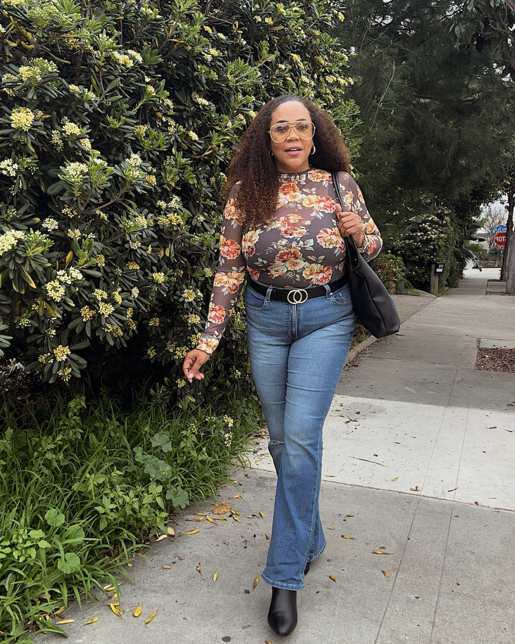 Ladies Over 40: Your 40s are not about chasing trends - it’s about going back to wearing what you love 💛. This floral 💐sheer top and bootcut jeans are giving 90s ✨ vibes and I’m so into it!

Sizing: Top size large, Jeans size 32 

#LTKootd #LTKMidsize #LTKOver40