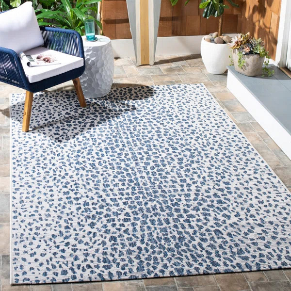 Tyron Animal Print Ivory/Navy Area Rug | Wayfair Professional