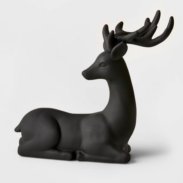 12" Plastic Sitting Deer Decorative Figurine Black - Wondershop™ | Target