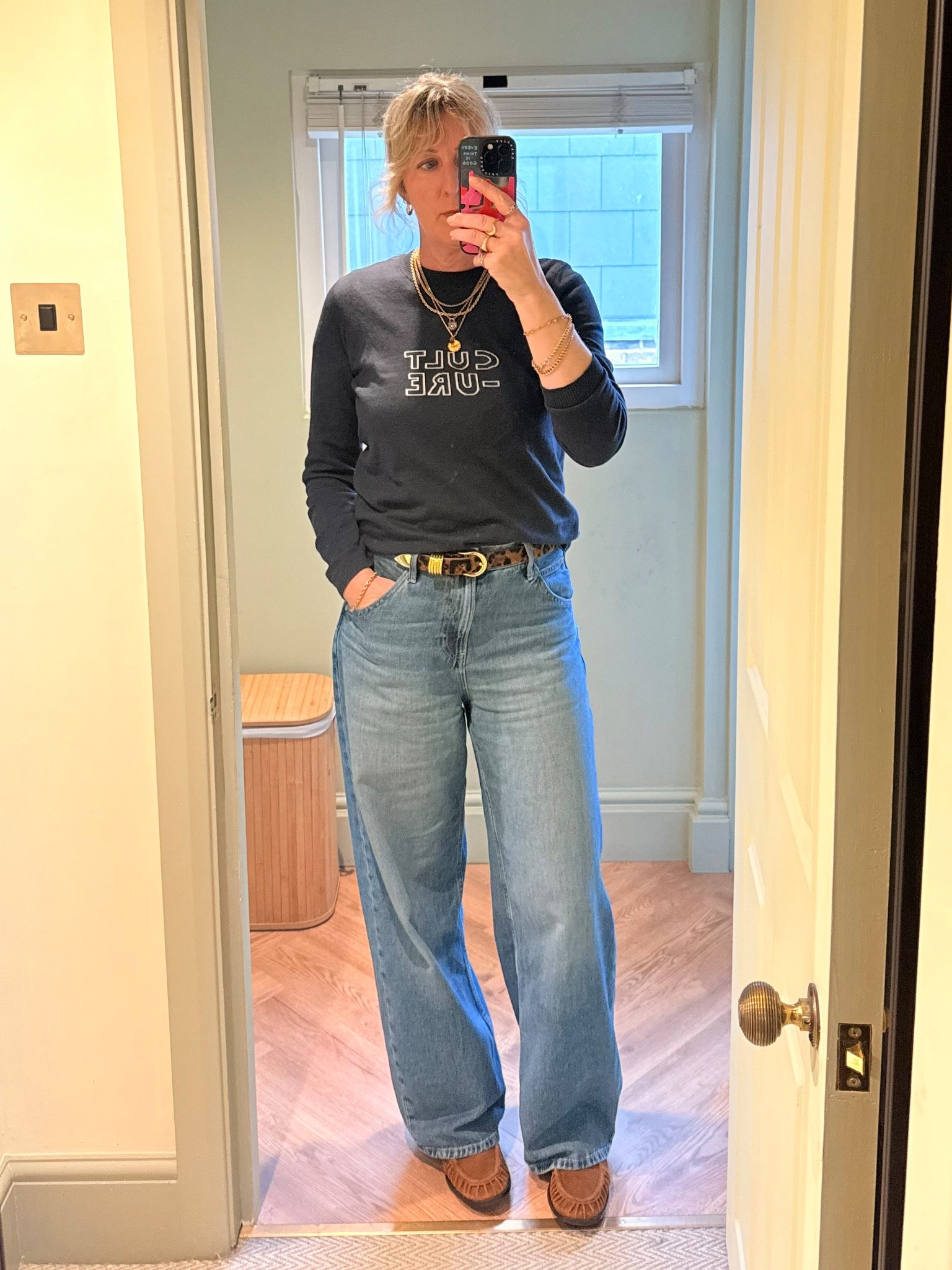 Bella Freud jumper and Uniqlo jeans 