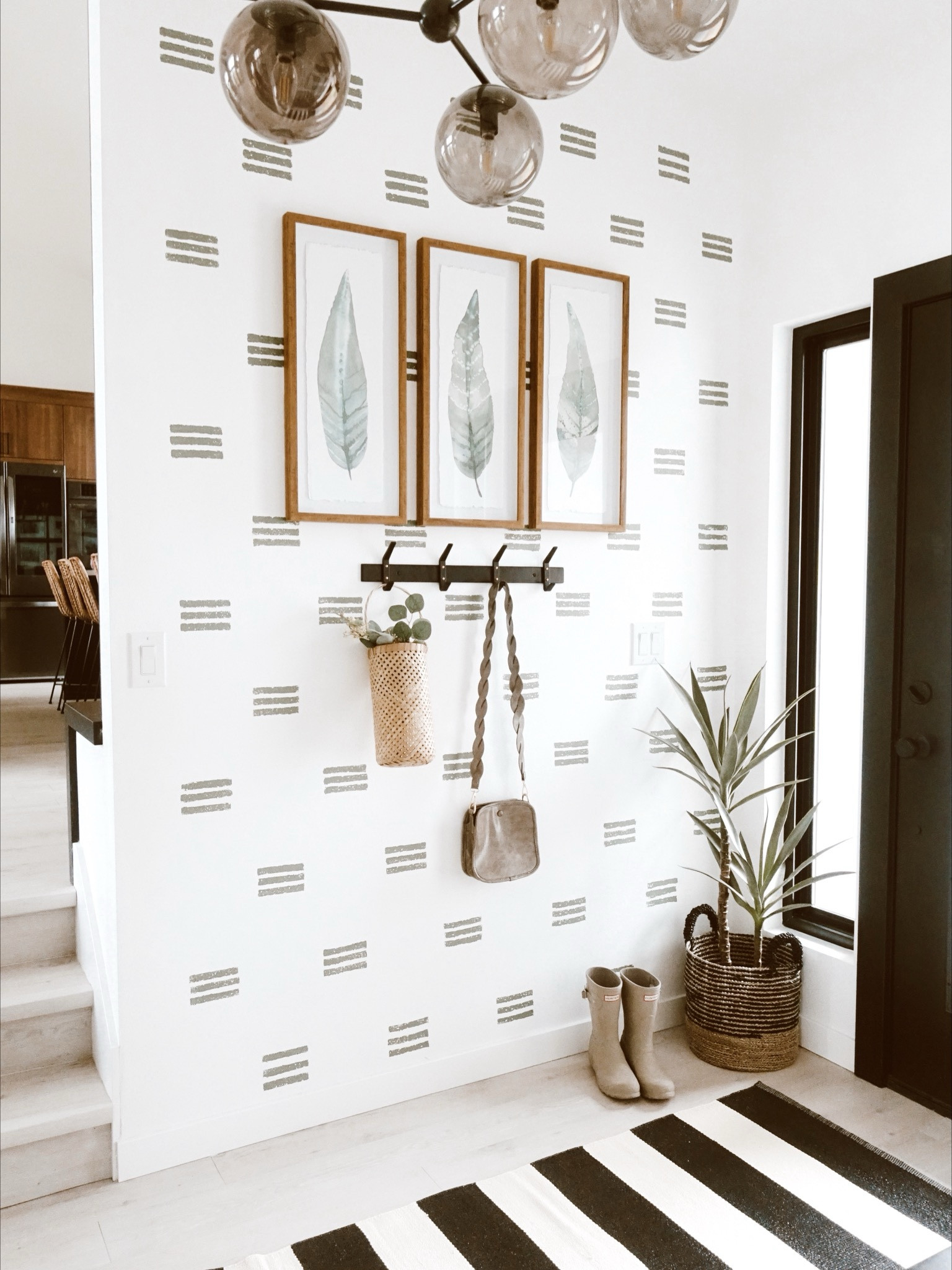 A beautiful set up in the foyer! Artwork - coot hook - Target home 

#LTKfindsunder50 #LTKhome