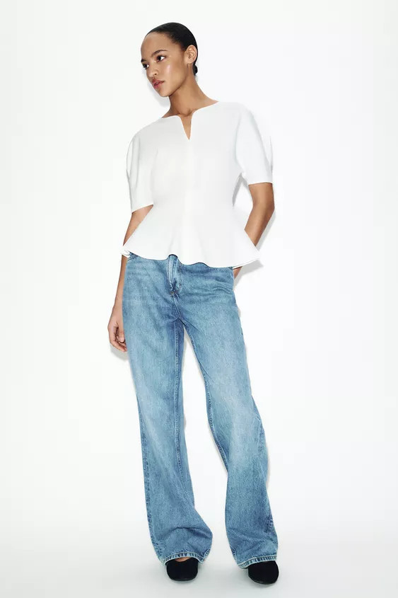 TOP EN MAILLE CÔTELÉE AVEC MANCHES BOUFFANTES | Zara FR