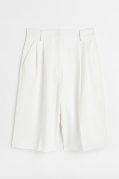 Conscious choice  Knee-length shorts in woven fabric. High waist and zip fly with hook-and-eye fa... | H&M (US)